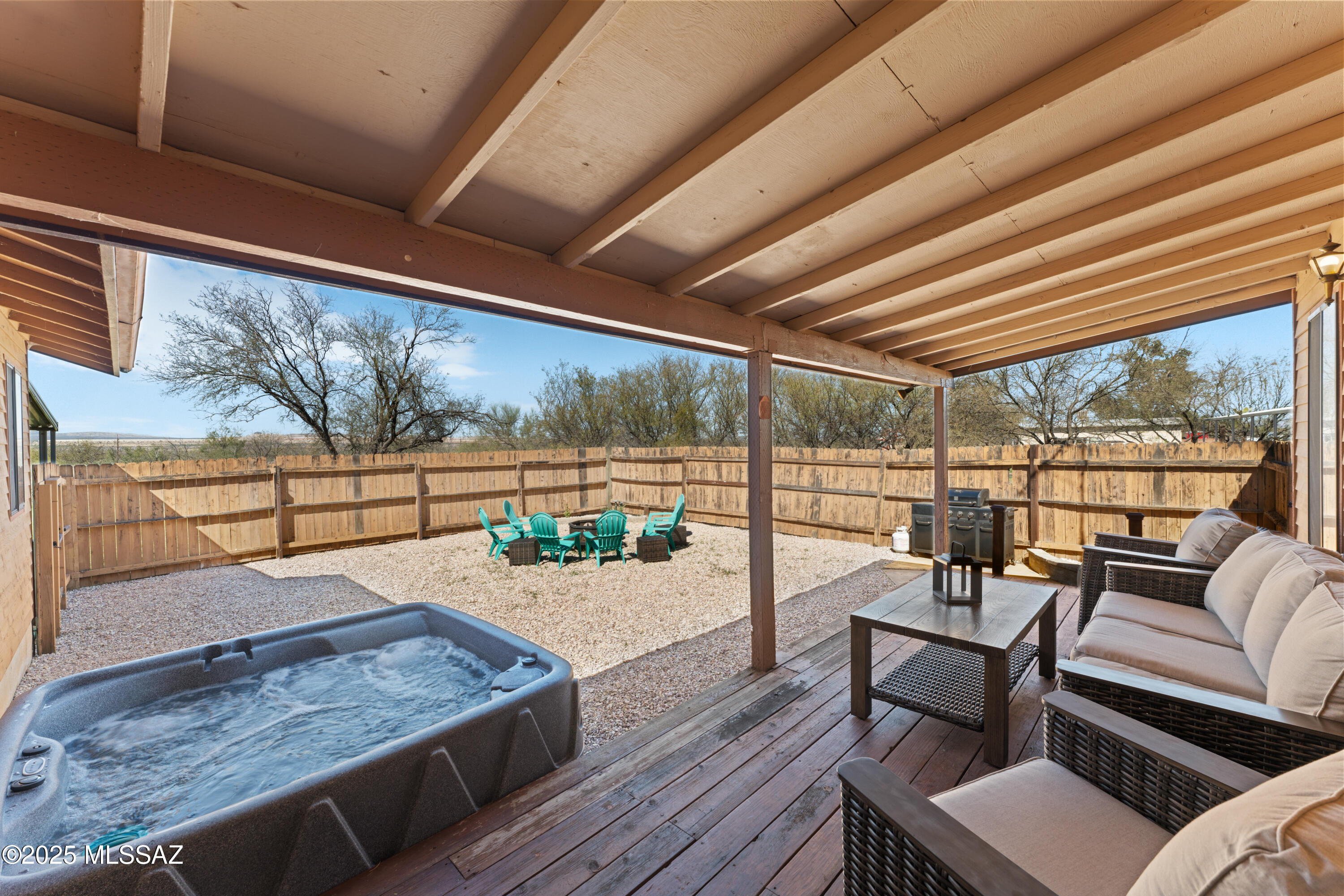 Rare multi-dwelling compound on 2 acres in Sahuarita featuring a 3 bed/2 bath main home, a retro 3 bed/1 bath trailer, two private studio units, a game room, and additional laundry facilities. Ideal for multi-generational living or income-producing potential. Open desert views, ample parking, and flexible use spaces throughout. Enjoy peaceful rural living just minutes from Sahuarita, Green Valley, and easy access to Tucson.

This is an active Short Term Rental inquire about investment opportunity!