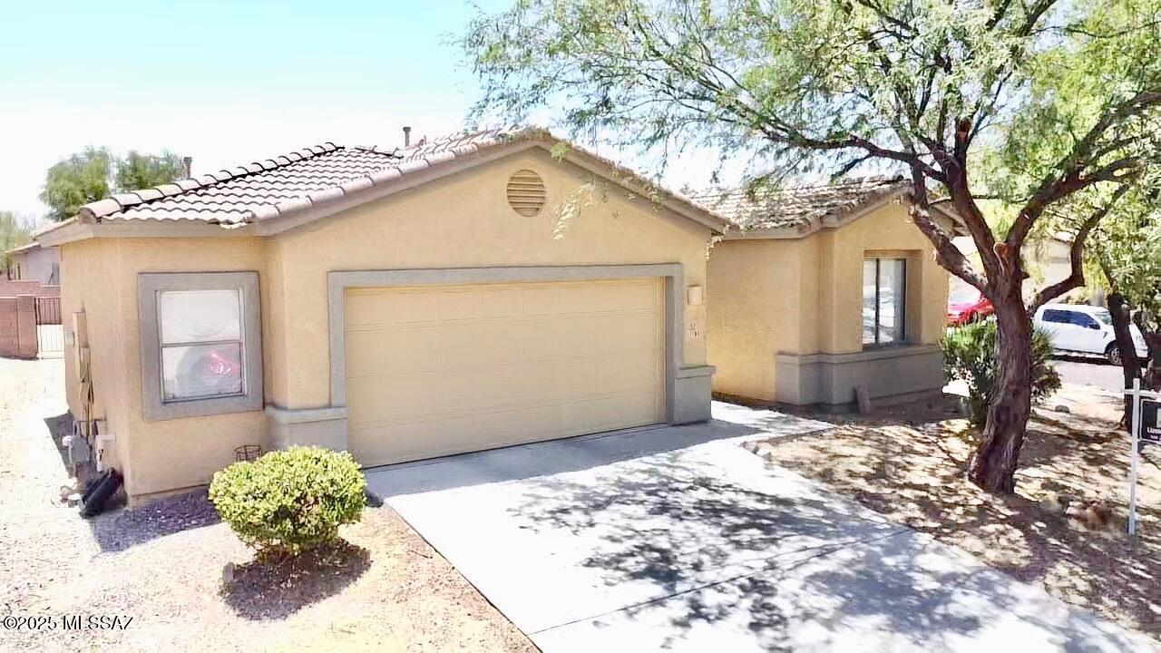 Gorgeous 3BD/2BA home on oversized corner lot in desirable Racho Del Lago community. Beautiful open/bright kitchen with extended counter/cabinets w/pull outs, built in desk, center island, upgraded tile backsplash and stainless-steel appliances. Great room off kitchen, split floorplan, office nook and custom paint and niches throughout. Spacious primary bedroom/bath w/ soaking tub, separate shower and large walk-in closet. Extended two car garage plus bonus area, easily fits any oversized vehicle. Lovely quiet and private low care backyard w/ flagstone pavers and extended covered patio. Great location close to golf, dining, shopping, award winning Vail school district and easy access to I10. Contact agent for showing!