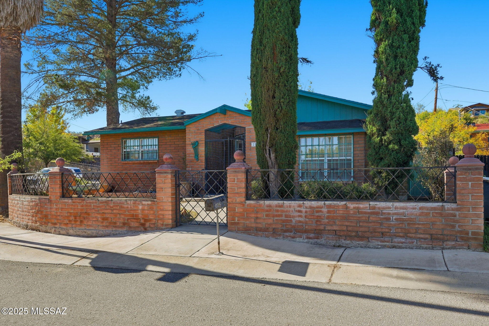 One of the nicest homes in a most desirable Nogales neighborhood, Valle Verde  !! This spacious home has beautiful upgrades including a completely remodeled gorgeous kitchen with large island w/ gas stove top & copper hood, granite countertops. The remodeled large master bedroom w/ a cozy fireplace & large walk in closet w/ 2 doors, looks out into the enclosed garden courtyard.  The master bathroom is quite exquisite with a walk in marble shower, large jacuzzi tub, double vanities w/ a 3rd sink, marble flooring ! The second bathroom has also been tastefully remodeled and has a walk in marble shower and ceiling high mirrors.  The enclosed lushly landscaped courtyard is surrounded by the kitchen, master bedroom, 3rd bedroom (no closet), Luxurious upgrades, fairly new roof !! Original owner