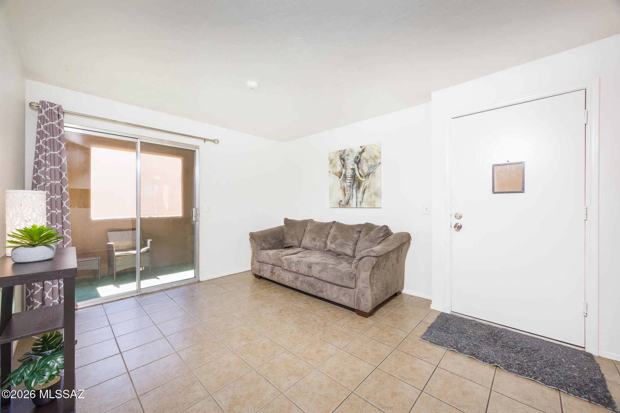 This turnkey beautifully maintained, 1bd/1ba gated condo includes an approx. $8,0000 credit to be transferred to the buyer at closing for the current Sp. Assmt, offering exceptional value.  Located near popular shops & restaurants, this home offers comfort & convenience.  The screened-in balcony overlooking the community pool & spa creates a private retreat to relax and unwind.  Ideal as a primary residence or second home.  Close to the University of Arizona and Banner UMC.