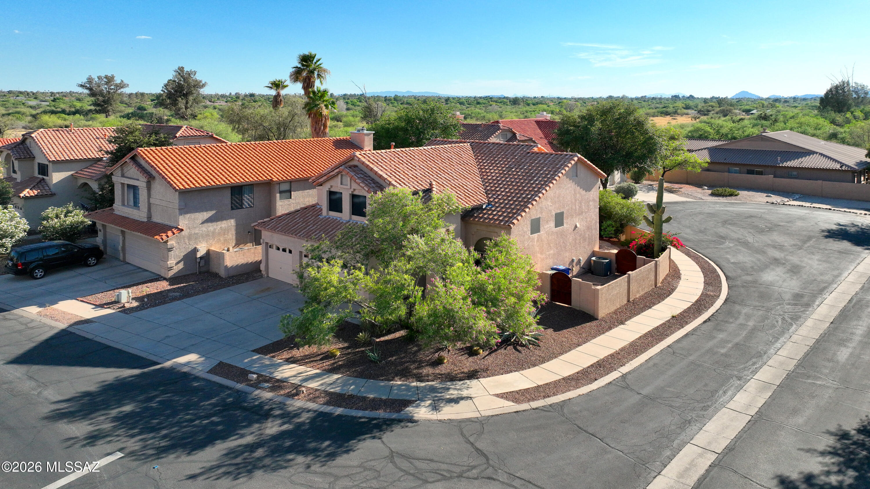 Ideally located inside the gated community of Lakes at Castle Rock. This neighborhood is a Tucson treasure located in the Tanque Verde Valley on the Northeast side with multiple lakes, walking trails, expansive grassy areas, and exceptional facilities.  Picture yourself walking along one of the lakes, the world famous Arizona sunset reflected on the water, while some of the neighborhood boys try their best to catch a fish. Its a scene that would bring a smile to Andy of Mayberry.  This home is located on a quiet cul-de-sac and a corner lot providing extra privacy.  3 bedrooms plus an upstairs loft ideally suited for a home office, den, or play area.  Be sure to view the Matterport for a virtual walk through of the wonderful homes.
