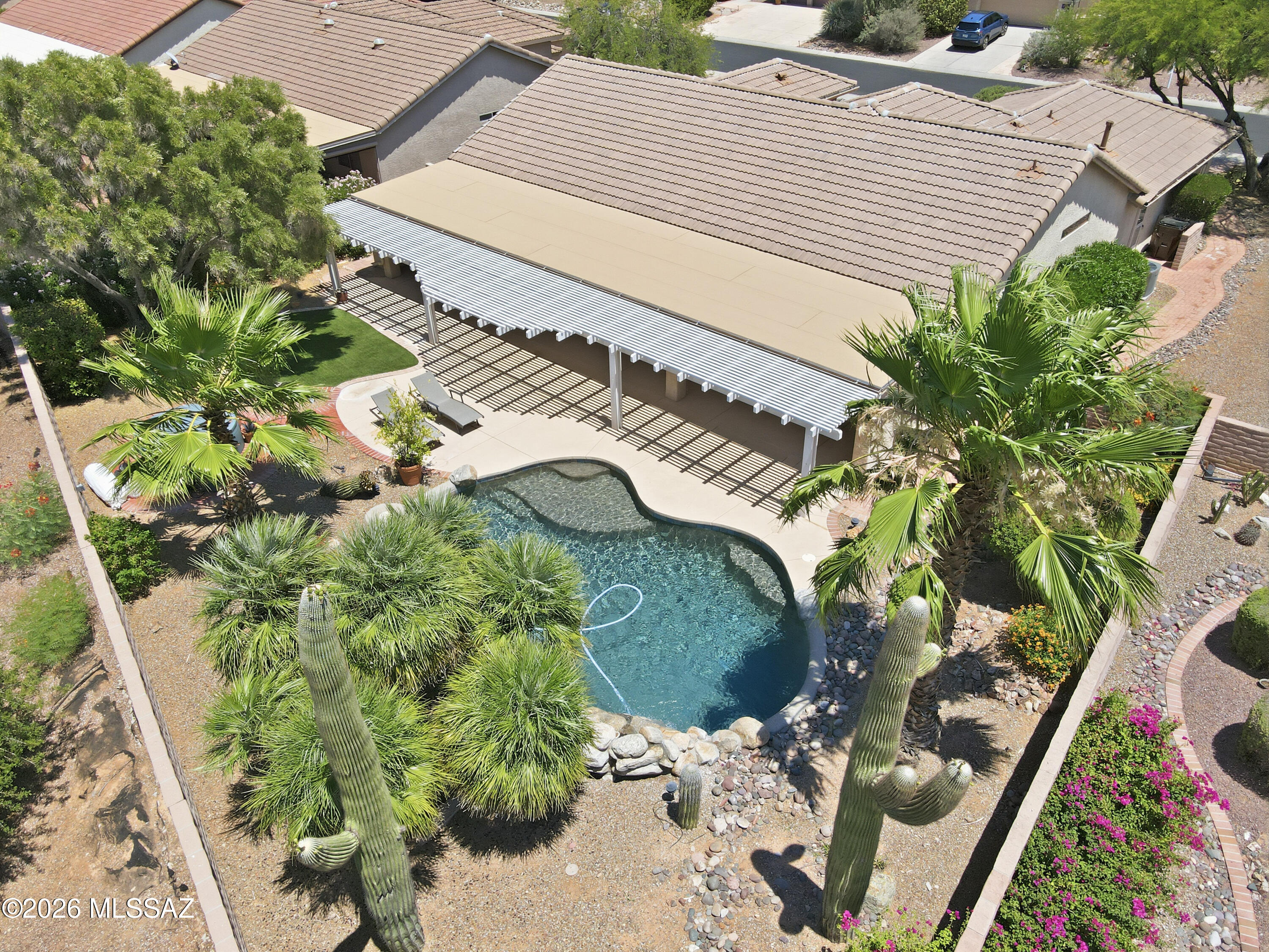 Unrivaled value meets resort luxury in Quail Creek! This expanded Laredo floorplan is a turnkey masterpiece reimagined from top to bottom. Avoid the massive fixing expenses and steep new build price tags. Step inside to brand-new flooring and an open living space. The chef's kitchen is a showstopper, boasting pristine quartz countertops, new kitchen cabinets, and stainless appliances. Both bathrooms feature matching quartz and new vanities. Structural peace of mind is secured with a newer roof and updated HVAC. Outside, your private backyard oasis awaits: enjoy a refreshing dip in the sparkling Pebble Tec pool, cook on your built-in grill, or relax in the hot tub. Schedule your tour today!