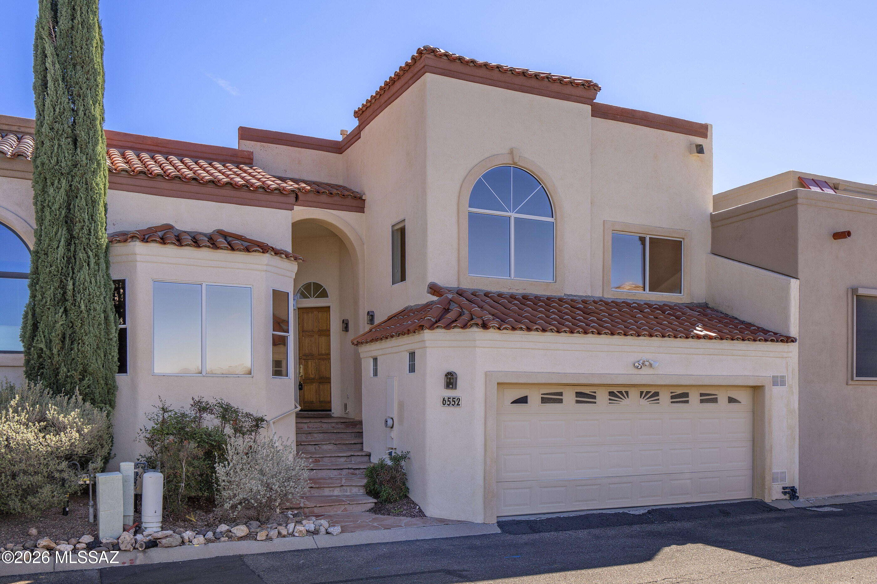 Located in the guard-gated Skyline Country Club community in the Catalina Foothills, this 2,687 sq ft multi-story townhome offers a wonderful opportunity to create your ideal luxury retreat. The home features two primary suites--one on the first floor & another on the upper level--along w/ a guest bedroom & adjacent flex space perfect for an office, den, or sitting area. The spacious kitchen offers abundant cabinetry & great functionality. An inviting great room w/ soaring ceilings and a cozy fireplace. Enjoy low-maintenance outdoor living right on the fairway w/ stunning mountain views. Additional highlights include a two-car garage &, dedicated laundry room. The ease of townhome living in one of Tucson's most desirable communities.  Tremendous potential in an exceptional location!