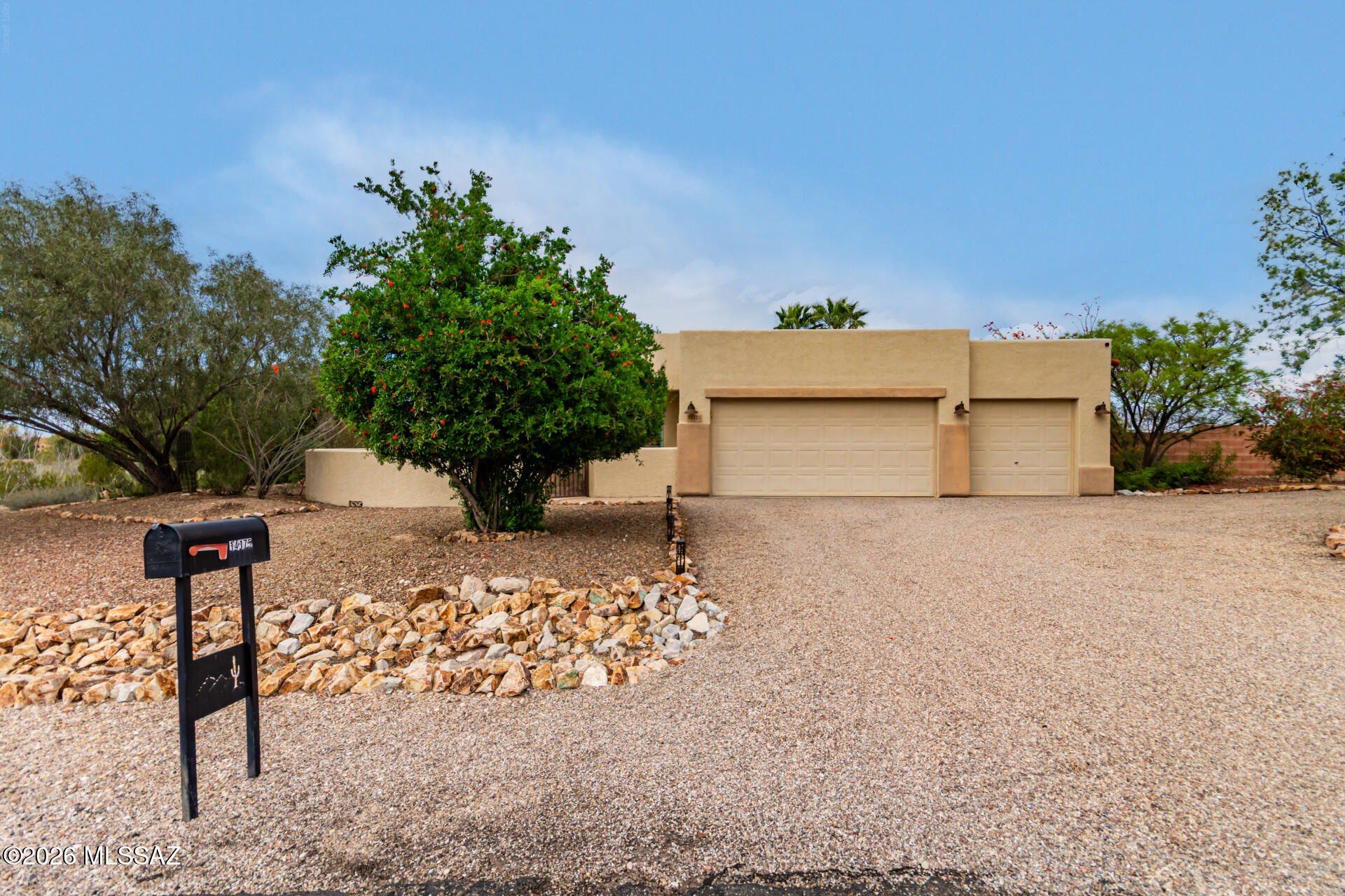 Priced to sale under appraised value! The search for the perfect retreat ends here! Located on a spacious .894-acre lot. This amazing 2,455 sq ft home includes a split floor plan, 3-bedrooms, 2-bathrooms featuring a graceful circular driveway, a spacious 3-car garage, an RV gate, and a thoughtfully designed low-maintenance desert landscape. An intimate courtyard sets the tone for rest and renewal from the moment you arrive.  Don't forget about the sparkling pool with a beautiful waterfall feature and a hot tub- ideal for soaking up the sun and enjoying serene evenings in the Sonoran Desert.

Inside, the calming living space offers soaring ceilings with elegant crown moulding, a soothing neutral palette, classic plantation shutters, and warm wood-look vinyl flooring, creating an atmosphere of quiet comfort and connection. Enjoy the separate dining room that simply elevates your dining experience. 

At the heart of the home, the beautifully appointed kitchen becomes a gathering place for friends and family, featuring a cozy breakfast nook, sleek quartz countertops, gas range/oven, lots of crisp white cabinetry, a tasteful tile backsplash, stainless steel appliances, a generous sized walk-in pantry, and an island with a breakfast bar perfect for casual dining. 

Through double doors, the primary suite serves as a private haven, complete with a spa-inspired ensuite offering dual vanities, a soaking tub designed for deep relaxation, and a spacious walk-in closet. The remaining bedrooms are ample size and share the hallway bathroom. 

The backyard is a peaceful escape with a covered patio for shaded reflection, a putting green for mindful recreation, a refreshing pool, and breathtaking mountain views that ground and inspire. With ample space to unwind, gather, or simply be still, this home is a true setting for rest, connection, and rejuvenation.

Step into your own private outdoor oasis, where every detail is designed for relaxation and elevated living.  The backyard unfolds as a resort-style retreat, featuring a spacious covered patio perfect for shaded lounging or offering a space for outside dining. A spectacular pool invites you to cool off under the sun, while the lush putting green offers a touch of leisure for golf enthusiasts. Surrounded by breathtaking mountain views, the setting feels both tranquil and expansive--an ever-changing natural backdrop that enhances every moment.

Whether hosting unforgettable gatherings or enjoying quiet evenings under the open sky, this outdoor sanctuary offers the perfect balance of beauty, comfort, and escape.

The washer & dryer does not convey with the sale.  Blinds, plantation shutters, Tv mounts, murphy bed will convey.