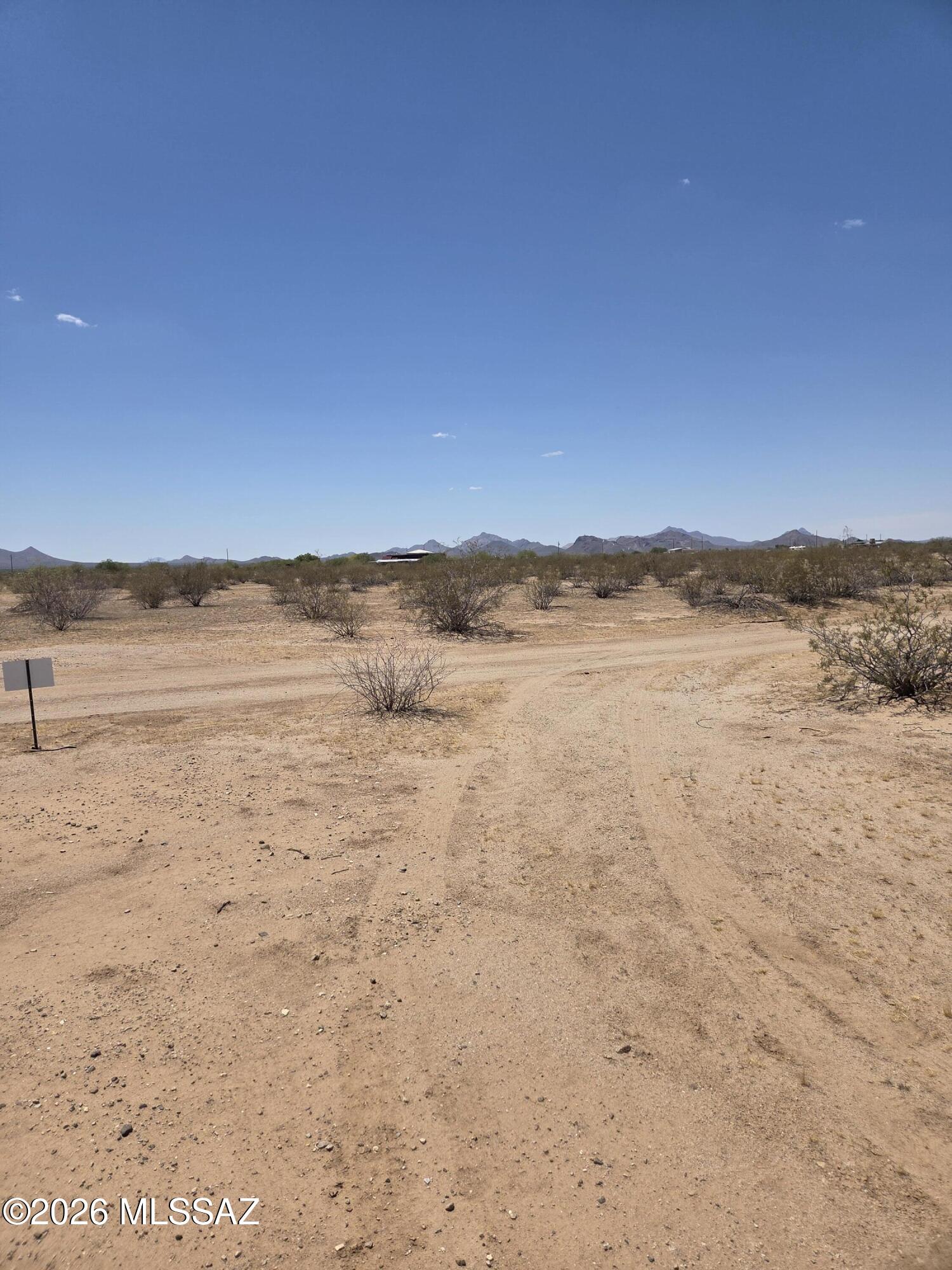 5 Acres of Country Living!  See Documents for best access.  Electric is 990' This parcel is the north half of tax code 208-46-011c.  Taxes are estimated.  Pima Count will most likely change address to Parrot Lane if permits are obtained