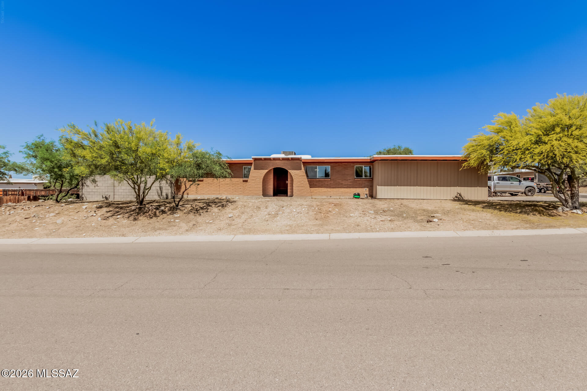 Fantastic opportunity to own this lovely 3-bedroom, 2-bath residence on a coveted corner lot! Discover an inviting living room with a soothing palette, wood-look flooring, sliding door access to the backyard, and a fireplace for relaxing evenings. The eat-in kitchen comes with solid surface counters, white shaker cabinets, recessed lighting, a sleek tile backsplash, and stainless steel appliances for a seamless cooking experience. The primary bedroom includes a private bathroom for added comfort. You'll also find an attached garage for secure parking. Unwind at the end of a long day in the charming backyard, showcasing majestic mountain views, a covered patio, stylish pavers, pristine artificial turf, and a couple of RV gates for large vehicles. Don't miss your chance to own this!