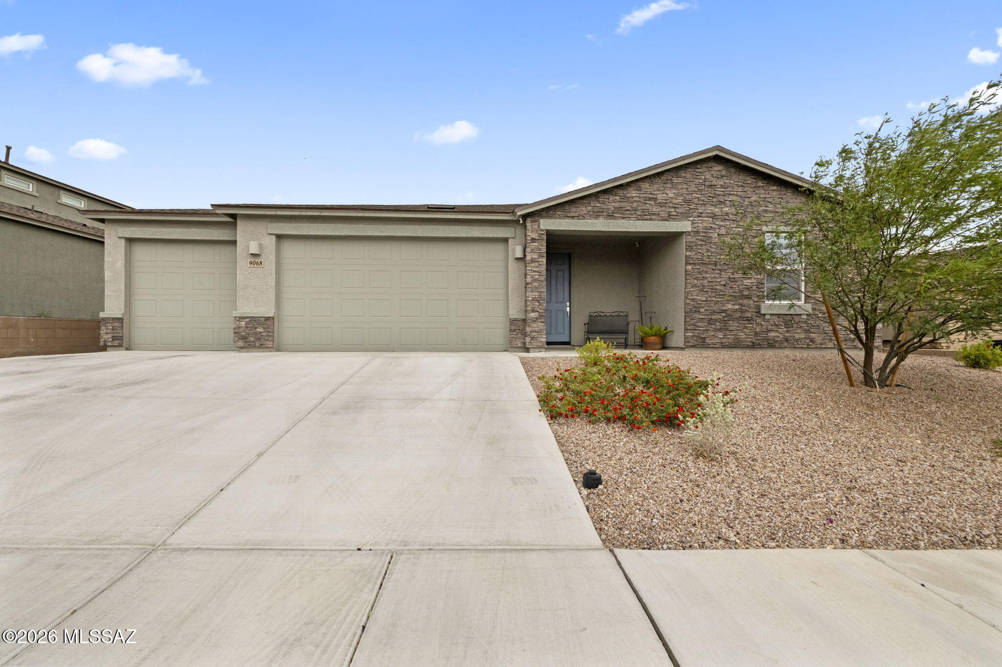 A finished yard, a fully epoxied 4 car garage and an assumable 3.75% interest rate make this home better than new! Situated on a prime lot with no rear neighbors & view fencing allow for unobstructed views of the gorgeous Santa Rita Mountains. The 4 car garage gives you endless possibilities, such as a home gym, while still giving you the space to park your vehicles safely inside. The kitchen is loaded with cabinets and counter space in a addition to a large walk-in pantry, giving you plenty of storage space. The clean white cabinets complement the granite counters throughout the home. The neighborhood also features a large park, swimming pool and spa, and walking trails allowing you to truly love where you live. Being located in the sought after Vail School District is the cherry on top!