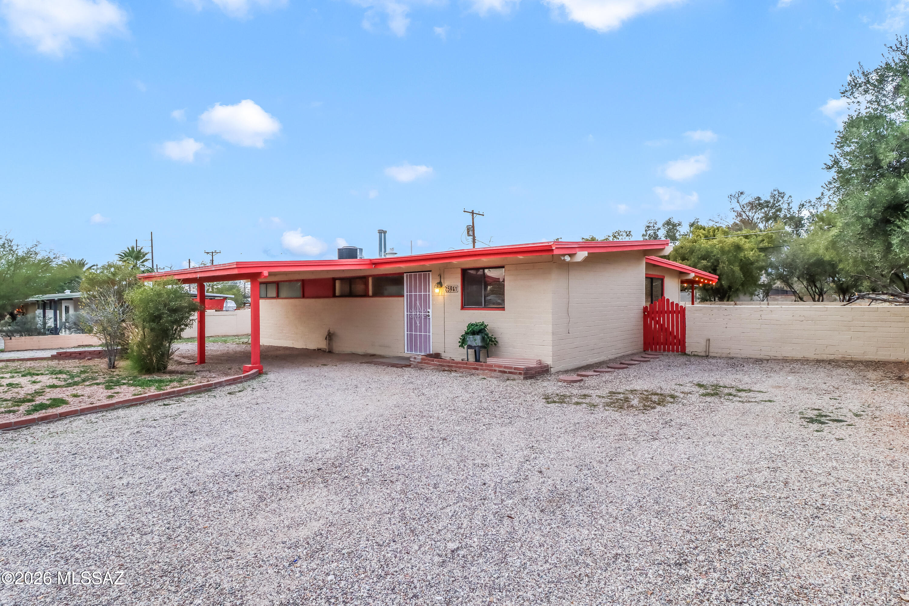 Price range $259,000-$269,000. Welcome to Waverly Place—a mid-century masonry home on a large lot in Central Tucson. This affordable 3 bedroom home offers a spacious open concept common area with vaulted ceilings and wood beams. The entire home is tiled for easy upkeep and durability. The bedrooms are functionally laid out with ample closet space. All applianced convey with acceptable offer. Come. See. Stay!
Buyer to verify SF.