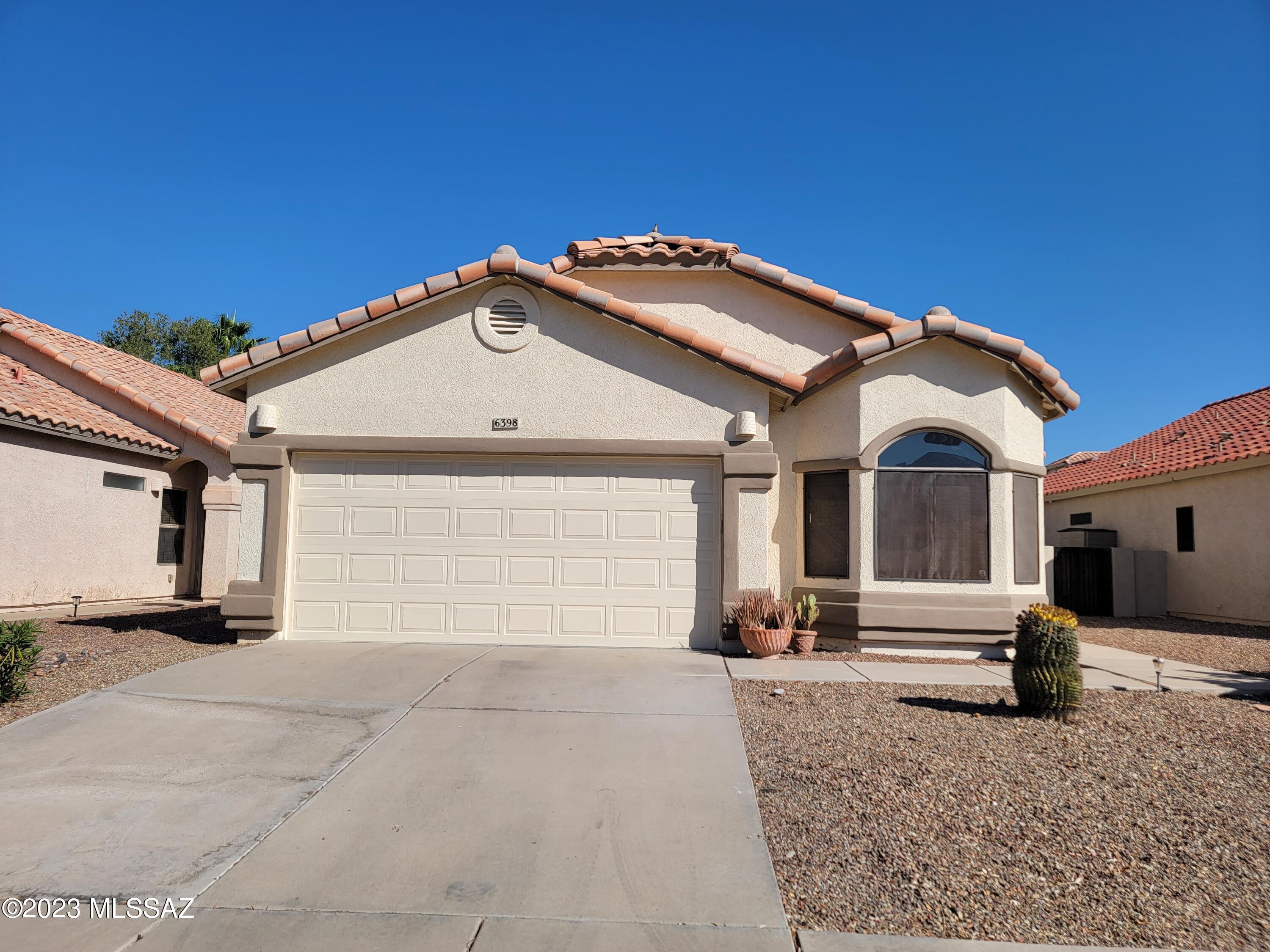 This conveniently located 3-bedroom PLUS a den, 2-bath, 2 car garage home with access to the Community Pools is ready for a new renter! Back yard has pavers and gravel.  Washer and dryer included. pets upon approval, no cats. Krasnick realty represents landlord only on this listing.