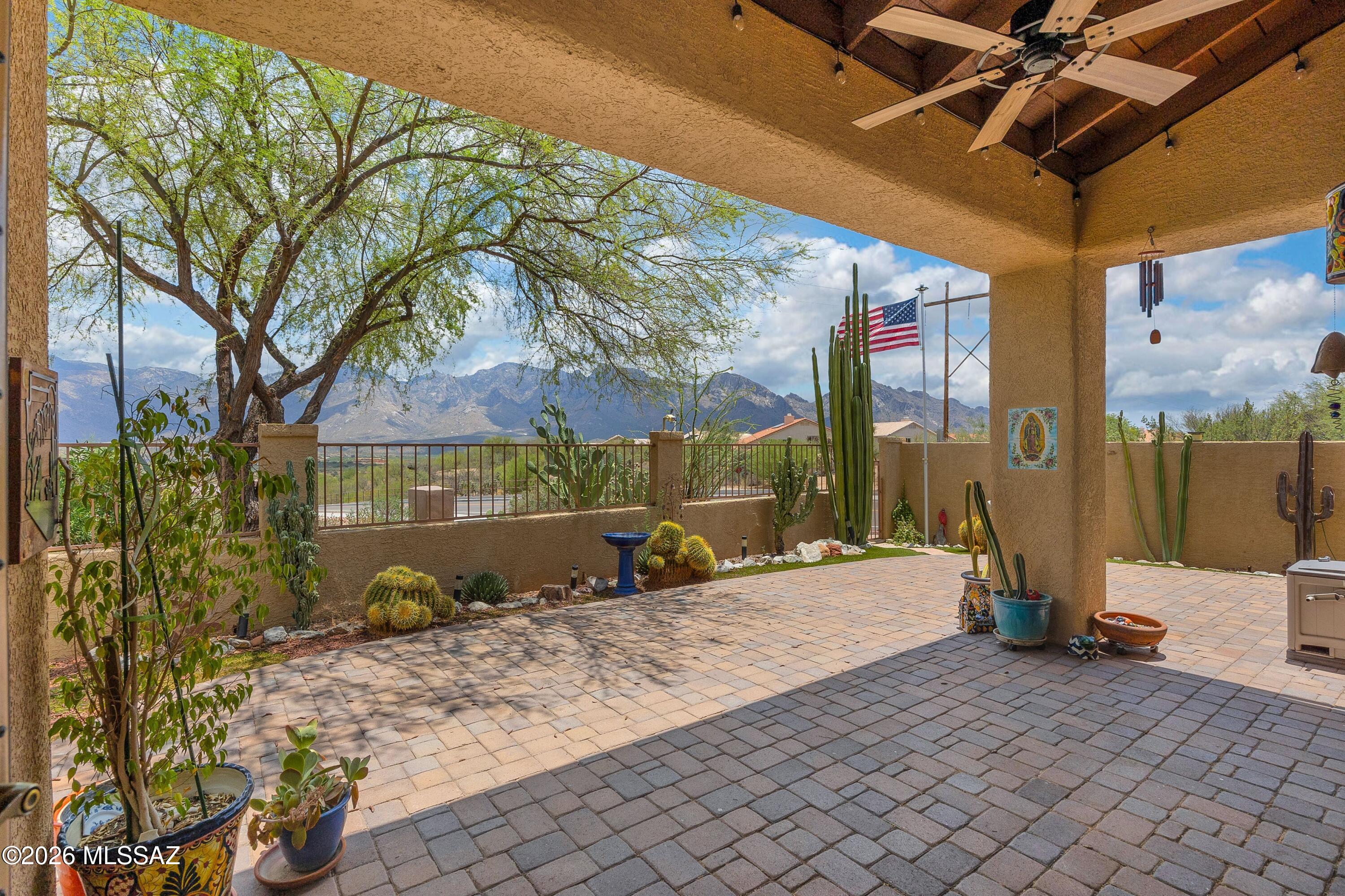 Welcome to Your Next Chapter in Oro Valley!

Nestled in the ''Valley of Gold,'' this darling 3bedroom,2.5 bathroom patio home offers the perfect blend of luxury living, convenience, and comfort. Situated on a spacious lot that offers easy access to the area's beautiful walking paths, this property is designed for an effortless indoor-outdoor lifestyle against the captivating backdrop of the majestic Santa Catalina Mountains.Step inside to a bright, open great room featuring a cozy fireplace just off the kitchen ideal for both relaxing and entertaining.
Recent upgrades include-Fresh Interior Paint throughout, Newer HVAC,Newer Anderson Windows paired with newer plantation shutters,
Newer Appliances, kitchen cabinets, granite counters, owned soft water system and leased solar. Located in a secure, gated community, this home is the perfect "lock-and-leave" property. 

The HOA covers:Roof maintenance and exterior paint,Front landscaping, Community gates, private roads, and the pristine community pool, spa and out door fireplace.

Beyond your front door, Oro Valley offers a rich lifestyle full of amenities.

Enjoy nearby walking and hiking trails, or hop onto The Loop, the famous bike path that wraps all the way around Tucson. The neighborhood features a dedicated dog park and a playground for the little ones. Everything you need is just minutes away:Conveniences: Grocery stores, top-rated Oro Valley schools, and the Oro Valley Hospital.Entertainment & Dining: The nearby Marketplace features a movie theater, fantastic restaurants, and the highly anticipated Mountainside Fitness center (opening soon!) and much more!

This little gem truly offers the luxury living and comfort that will meet all your needs. It is the perfect place to call home for your next chapter!