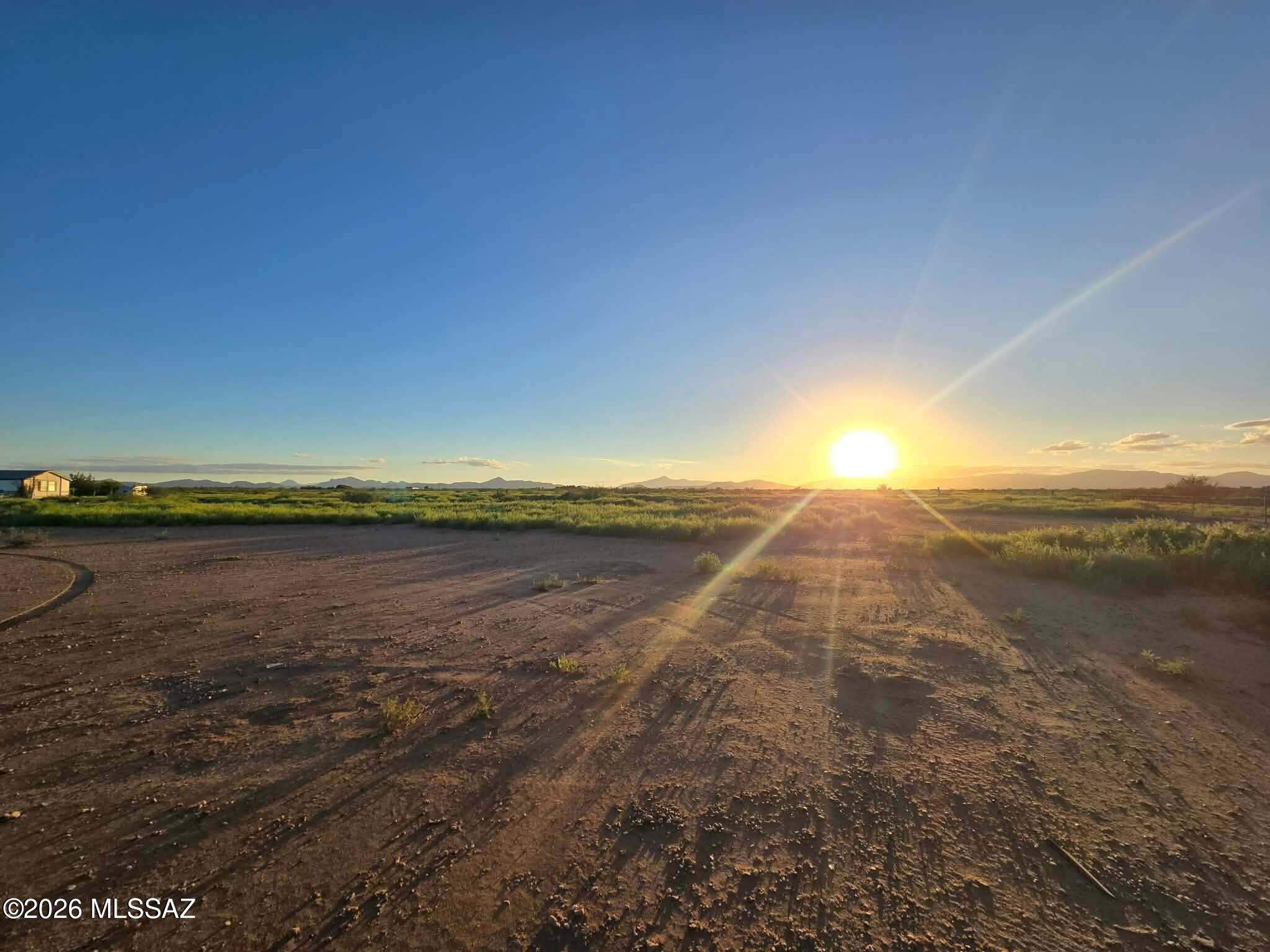 Discover a rare opportunity with this expansive 54.28 acre parcel of flat, undeveloped land nestled between the charming towns of Douglas and Bisbee, Arizona. Zoned RU-4, this property offers flexible rural residential potential--ideal for a private retreat, hobby farm, or future development.

Although landlocked, the parcel lies in close proximity to utilities, making access and infrastructure connections more feasible. The open terrain provides unobstructed views of breathtaking sunrises and sunsets, painting the sky with vibrant hues each day.

Imagine waking up to the serene desert dawn, with the rugged beauty of Cochise County stretching before you. The flat topography simplifies planning and construction, while the surrounding landscape offers a peaceful, off-the-grid lifestyle--