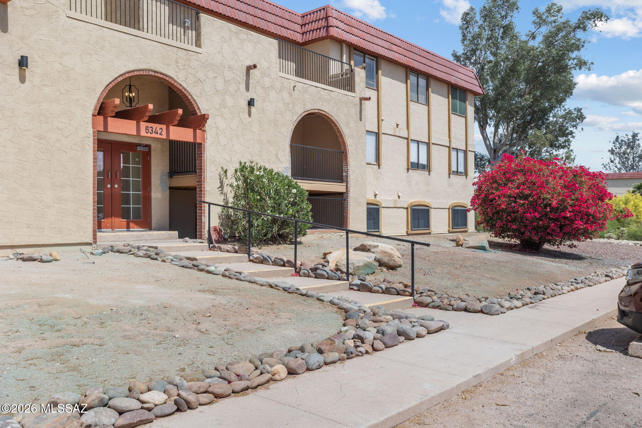This beautifully updated 4-bed, 2-bath condo priced at $164,500 is one to see! This top-floor corner unit has a beautiful, large balcony with panoramic views of the city and Tucson Mts. AC, sun-reflecting window screens, and ceiling fans in every room will keep you cool. Laundry room with washer and dryer. Close to Tucson Mall, restaurants, shopping, bus line, U of A, downtown, and the I-10 freeway. Enjoy the 2 community pools and clubhouse available to rent for all your gatherings. HOA dues cover gas, water, trash, pest control, landscaping, exterior and common area maintenance, and the roof. Assigned, covered parking and ample open parking for a 2nd vehicle or guests. This 17-acre community is spread out with room to roam! Seller financing possible. Bring all offers today!