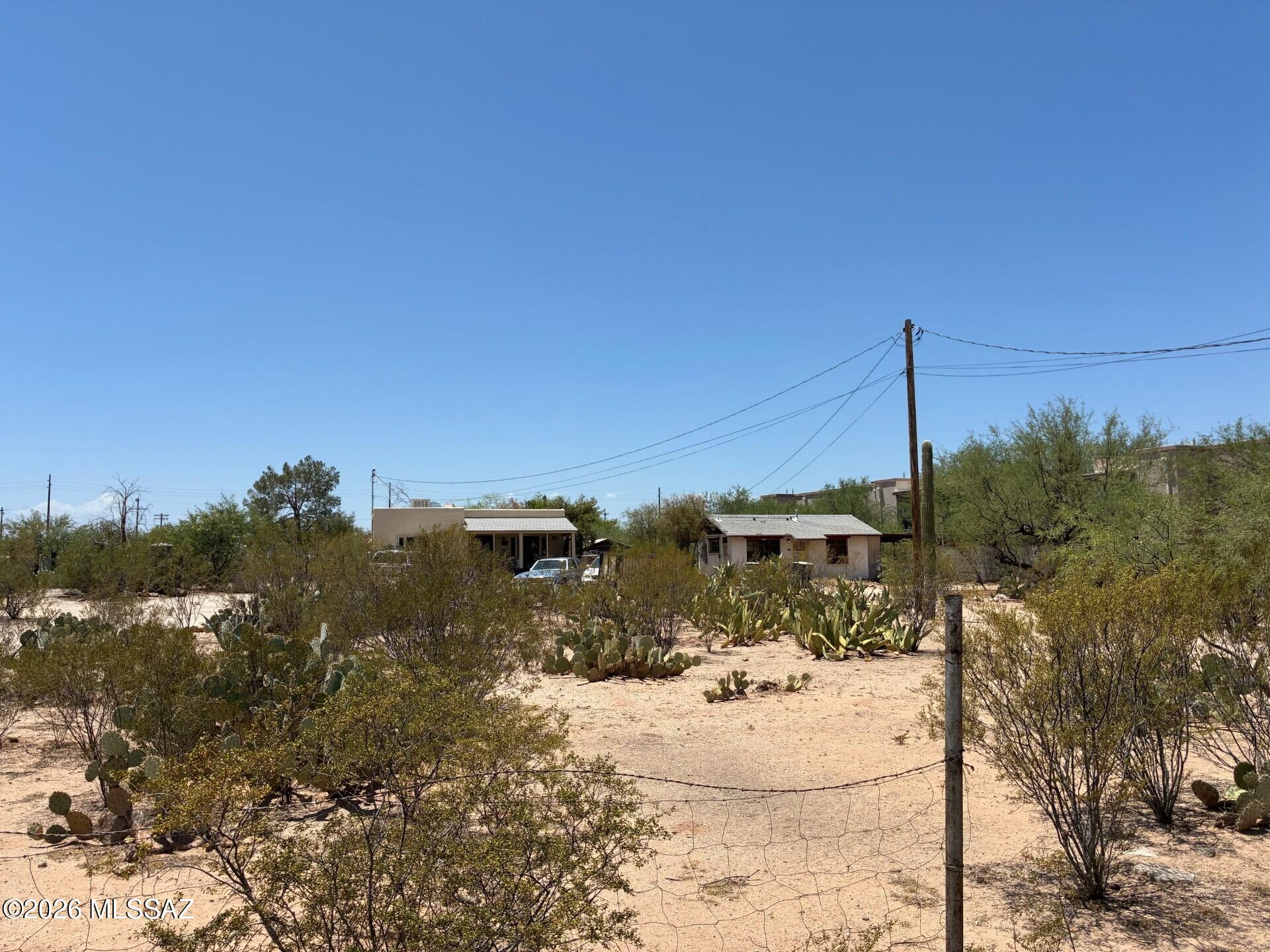 Two units on 1.14 acre.  East unit (1110)  is 2 bedroom 1 bath 734 sqft and is currently  occupied. West unit (1106) is 1 bedroom 1 bath 384 sqft and is currently vacant and being upgraded (once upgraded projected rent for West unit is $875.00 mo.) Lots of potential with land value and building possibilities. Large 480 sqft covered storage in back of property. Please do not disturb tenant. THIS IS AN R-2 LOT AND CITY OF TUCSON HAS SAID IT IS SPLITABLE.    LOTS OF POTENTIAL.  SOME FINANCING COULD BE AVAILABLE.