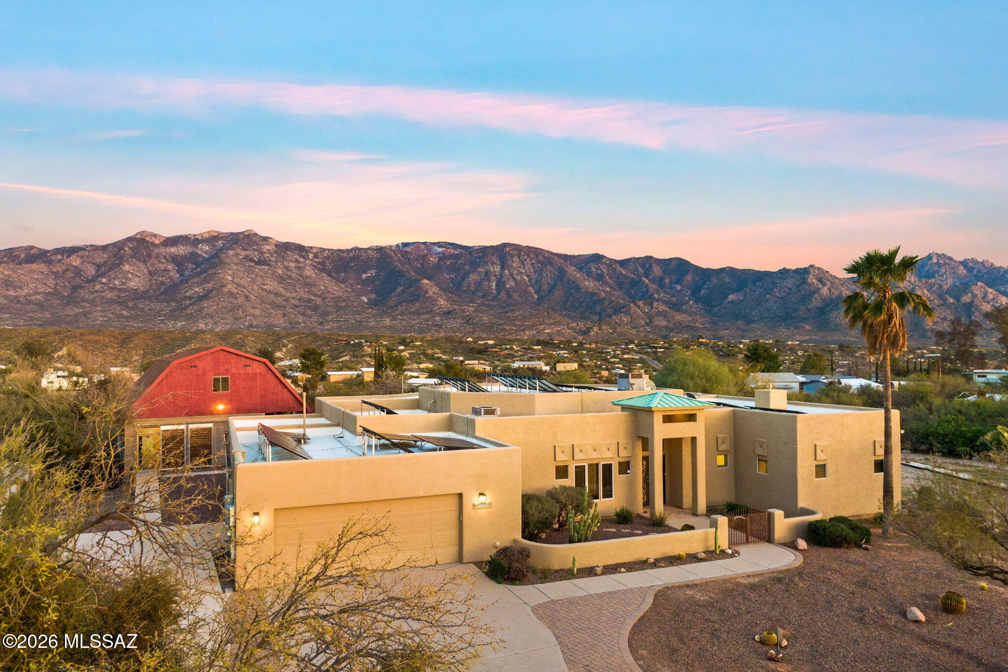 Experience refined desert living in this recently updated luxury retreat offering a 3 bed, 3 bath main residence w/dual suites - paired with a private 1 bed, 1 bath guesthouse - perfect for multigenerational living, hosting, or added flexibility. Designed for both comfort and elevated entertaining, the home features a spacious open great room filled with natural light, granite countertops, stainless steel appliances, and seamless indoor outdoor flow. Enjoy stunning panoramic mountain views, no HOA, and a very large covered backyard patio, creating the ideal setting for relaxing, entertaining, and embracing the Tucson lifestyle. Owner/Agent. The guesthouse offers privacy and versatility for visitors, extended family, or a dedicated workspace. Recent updates throughout provide a fresh, contemporary feel, while the expansive layout and inviting living spaces make everyday living effortless. The lot provides room for an RV, and the oversized garage offers ample space for vehicles, toys, and storage. This is a rare turnkey opportunity blending luxury, flexibility, and timeless desert charm. Owner/Agent.