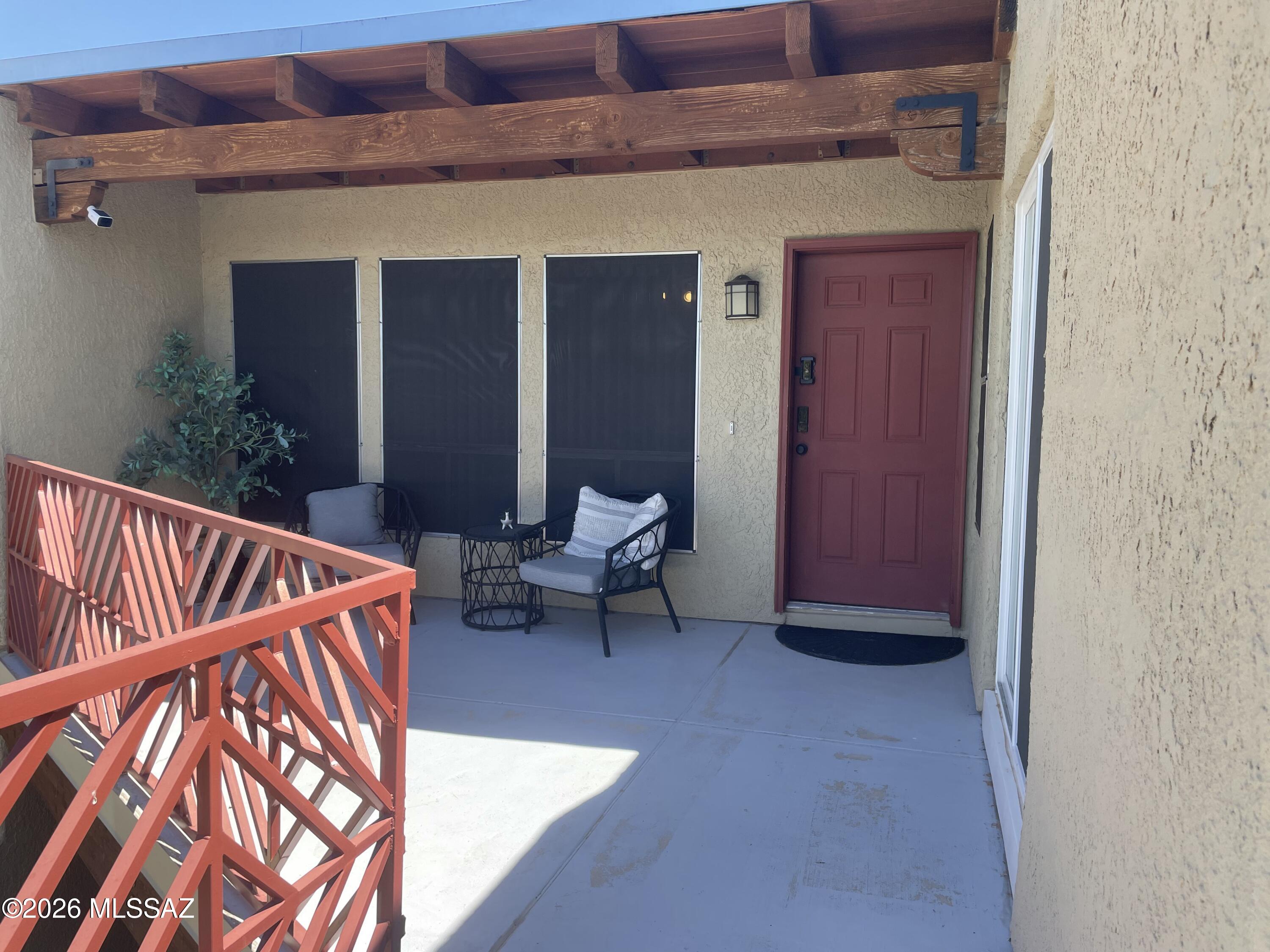 Great Investment Opportunity! Tenant occupied. Lease expires July 2027. Charming upper-level condo located in the desirable Foothills community of Reflections In The Catalinas. This 2 bed/1 bath/969 sq.ft unit offers Mountain views from the front patio & main suite. Cozy kitchen offers plenty of updated cabinets, newer appliances, breakfast bar & tile counters. Spacious bedrooms. Family room has a cozy wood burning fireplace. Additional outdoor storage located under stairs. Community amenities include a pool, spa & workout facility. HOA covers water, trash, sewer, pool, common area maintenance & more.