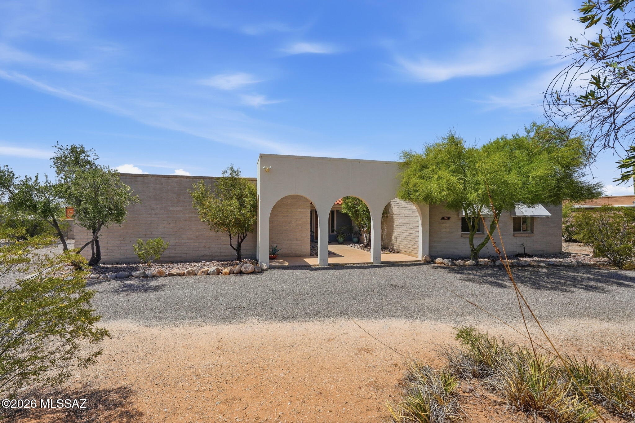 Solid home on a large lot. Ample room for hobbies and toys. Sunset views from fully fenced block wall with RV gate. Mini split in garage. Property line extends past the block wall. Close to Tohono Chul, Casas Adobes, easy access to the Foothills, Oro Valley and only minutes to Northwest Medical center. Come see what a value this property is! Allowance provided for flooring. Cameras on property, do not disturb the owner.