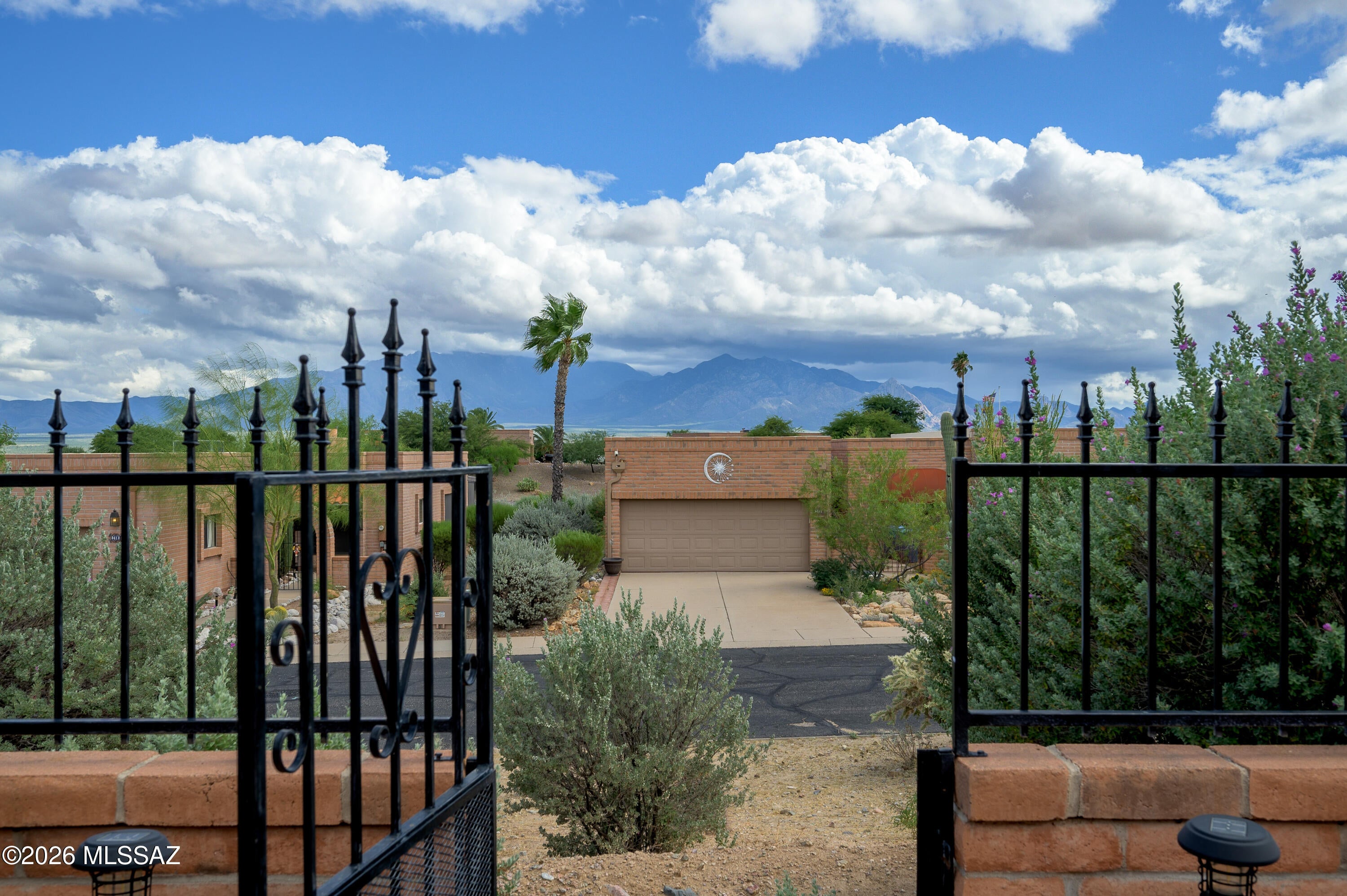 Captivating mountain views you can spend hours soaking up are the heart of this fully furnished Green Valley retreat in an ideal location. Picture quiet mornings on your private paver patio, coffee in hand, with the mountains right in front of you. Inside, 1,750 sf of comfortable living with all tile flooring holds 3 bedrooms and 2 baths. Stroll to the walking park, grab a cup at the brand new coffee shop, and enjoy the Del Sol Clubhouse and walking trails & game room close to home. Whether you want full time living or a seasonal getaway, this move in ready home is waiting for its next chapter. Watch the video tour and fall in love. Move right in to enjoy your Green Valley 55+ dream home.