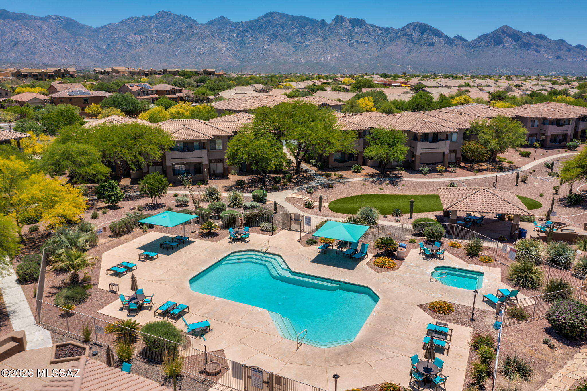 UPDATED COZY CONDO Highly sought-after Vistoso Resort Casitas.  Calling all Snowbirds for your 2nd home or Investors. Enjoy this TURN-KEY 1st Floor Home with True Resort Style Living! Clubhouse w/ Pool/Fitness. Lush Desert & Beautiful Wildlife Views from your private patio. UPDATED THROUGHOUT with Granite Counters, Beautiful Cabinetry and Stainless-Steel Appliances! Both Primary and Guest Bds have En-suites with granite counters. Newer Water Heater. HOA includes in-unit internet modem with WIFI, basic cable, water, trash, recycling, landscaping, maintenance and more. Enjoy the beautiful town of ORO VALLEY (VOTED SAFEST CITY IN US) w/MAJESTIC CATALINA MOUNTAIN VIEWS, Award Winning Golf Courses, Walking-Cycling Trails and More! Home is very close to SHOPPING, DINING, banking and hospital.