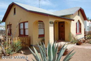 ADORABLE, CHARMING FULLY RESTORED 1920'S BUNGALOW W/ HARDWOOD FLOORS, COVED CEILINGS, COZY FIREPLACE, COVERED FRONT PORCH, FRENCH DOORS LEADING TO PRIVATE ENCLOSED EAST SIDE PATIO, A/C, LOTS OF PARKING IN BACK, FULLY FENCED BACK YARD W/ FIREPIT, PAVERS, TREES & MOUNTAIN VIEWS, ROLLING SHUTTERS ON BDRM WINDOWS PLUS FULL SECURITY SYSTEM. LOCATED VERY CLOSE TO THE MOUNTAIN BIKE PATH & ONLY ONE MILE FROM UA! RENT INCLUDES WATER, GARBAGE & SECURITY SYSTEM MONITORING. GUEST HS IN BACK YARD IS CURRENTLY RENTED. FREE STANDING LAUNDRY RM W/ WASHER/ DRYER IS SHARED BY TENANT IN GUEST HS. OWNER/ LANDLORD IS LISTING AGENT. SMALL, WELL-TRAINED PETS ARE ALLOWED. ENJOY A PIECE OF TUCSON HISTORY: THIS RESTORED BEAUTY TURNS 100 THIS YEAR! DON'T BE FOOLED BY GRANT ADDRESS. BUFFER LANE BETWEEN GRANT & HOUSE!