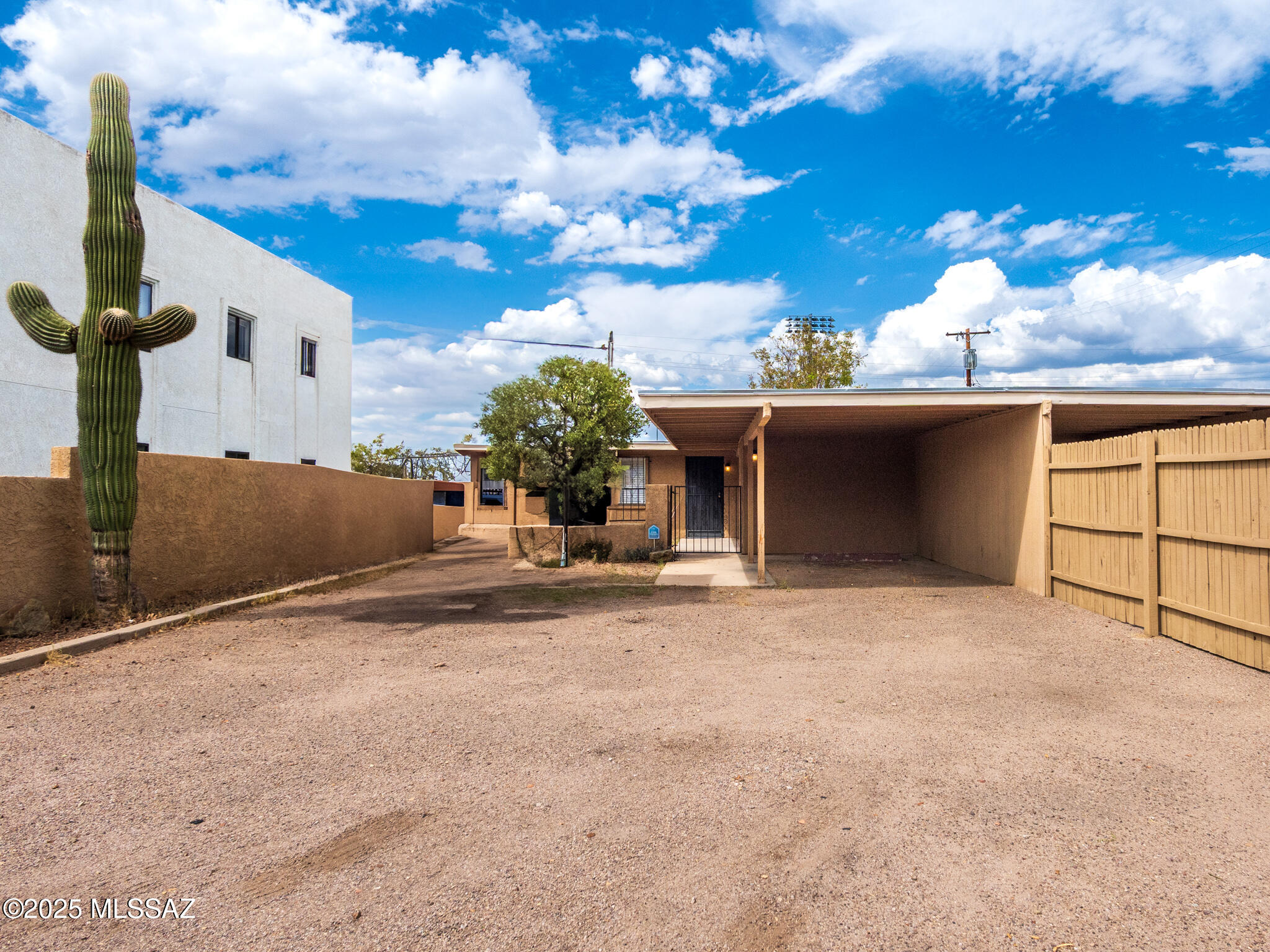 Text for a Walkthrough Video/more info. Remodeled One-story Brick 2 Bedroom/1 Bathroom 850sf Duplex Unit located in MidTown Tucson near Reid Park. Updates incl; Kitchen Cabinetry, Granite Countertops, Stainless Appliances incl Gas Range; Fresh Paint throughout; Ceramic Tile flooring; Central Air Conditioning. Outside, a private walled-in Backyard, Car Port + Laundry Room w/ Washer + Dryer incl, and Partially Gated driveway complete the Amenities. 12mo minimum Lease. Costs are; Non-refundable $50/adult Application, $1375 Security Deposit, $150/pet with approved pet, $300 cleaning. Tenant pays electric, gas, and water/sewer/trash.