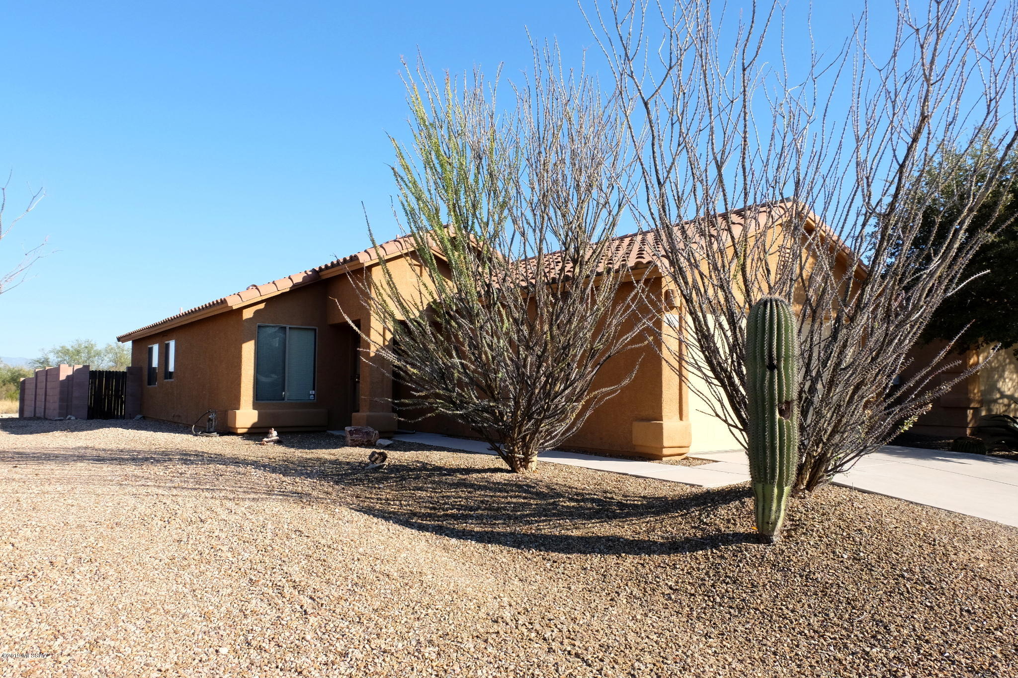 Text for a Walkthrough Video/more info. Incredibly well-maintained 3 Bedroom/2 Bathroom single-story Home in Valencia Reserve South w/ SOLAR system, central air conditioning, tile floors throughout, open floorplan, island kitchen, + entertainer's backyard w/ fire pit, ramada, + stunning panoramic views of the Rincon + Catalina Mountains. Community is located close to the Valencia Corridor w/ Amazon Center, Tucson Int'l Airport, Homegoods, + Davis Monthan AFB. 1yr minimum Lease. Costs incl; non-Refundable $50/adult Application, $1795 Security Deposit, $150/pet with approved pet, $400 cleaning. Available immediately. Tenants pay all utilities.