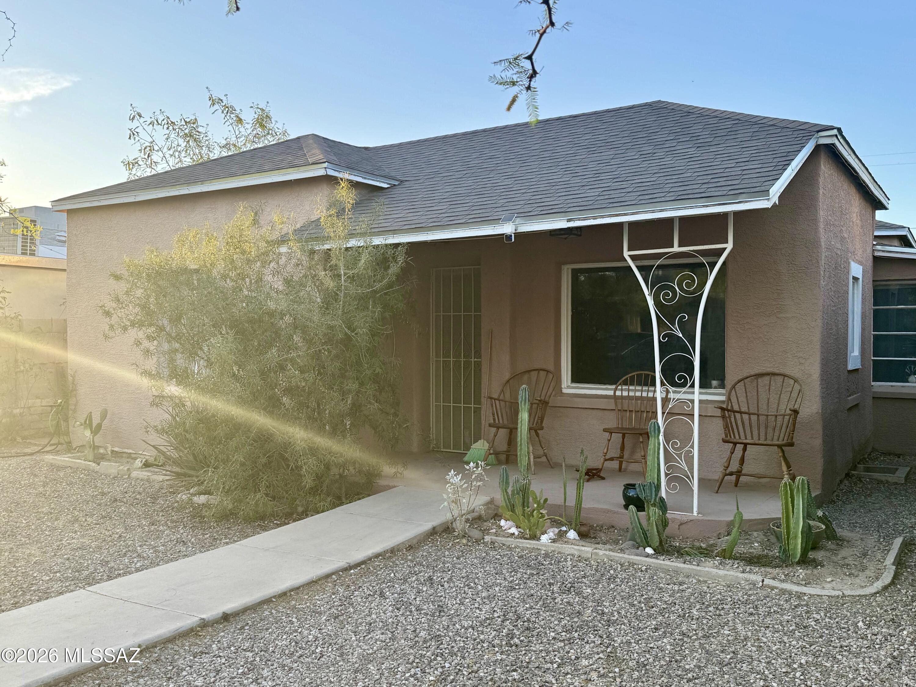 Don't miss this unique adobe home with updates throughout! Close to downtown and the I-10, this gem has a huge yard with plenty of space and a large gate with alley access, and even has a thriving garden currently bursting with with wheat, peas, cilantro, radishes, artichokes, and almost a dozen other varieties of mostly heirloom plants under a large shade cloth. This three bedroom home boasts two full bathrooms with updated plex plumbing completed when most of the sewer plumbing was redone in 2023. New roof was installed in 2024, new water heater was installed in 2024, and HVAC and furnace were replaced in 2022! Come take a look and make this beautiful home yours!