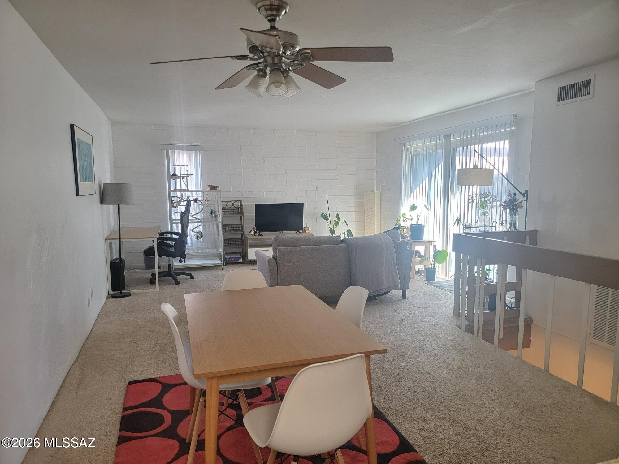 Prime location! Just a block away from the UA's main gate entrance.  Don't miss out on this fabulous condo.  Open floorplan with a spacious living/dining area and convenient powder room.  Fully furnished and move-in ready. Kitchen features granite counters, breakfast bar, stainless steel appliances, black top stove, microwave & dishwasher. The two bedrooms are huge (approx 15'3'') with large closets. Bathroom layout is designed for roommates. It boasts dual sinks, dual medicine cabinets, dual storage cabinets, dual stack of drawers and tub/shower.  This condo is a rare lower-level corner unit.  ALL the windows and balcony overlook the courtyard and are within the gated area. All the original tile was replaced with beautiful porcelain tile. The HVAC system was upgraded in 2019 with a heat pump. No gas inside the condo. Campus Walk is just steps to Main Gate Square featuring numerous restaurants, shops and the trolley to 4th Ave and downtown. The Marriott Hotel is located across the street for all your out-of-town guests.