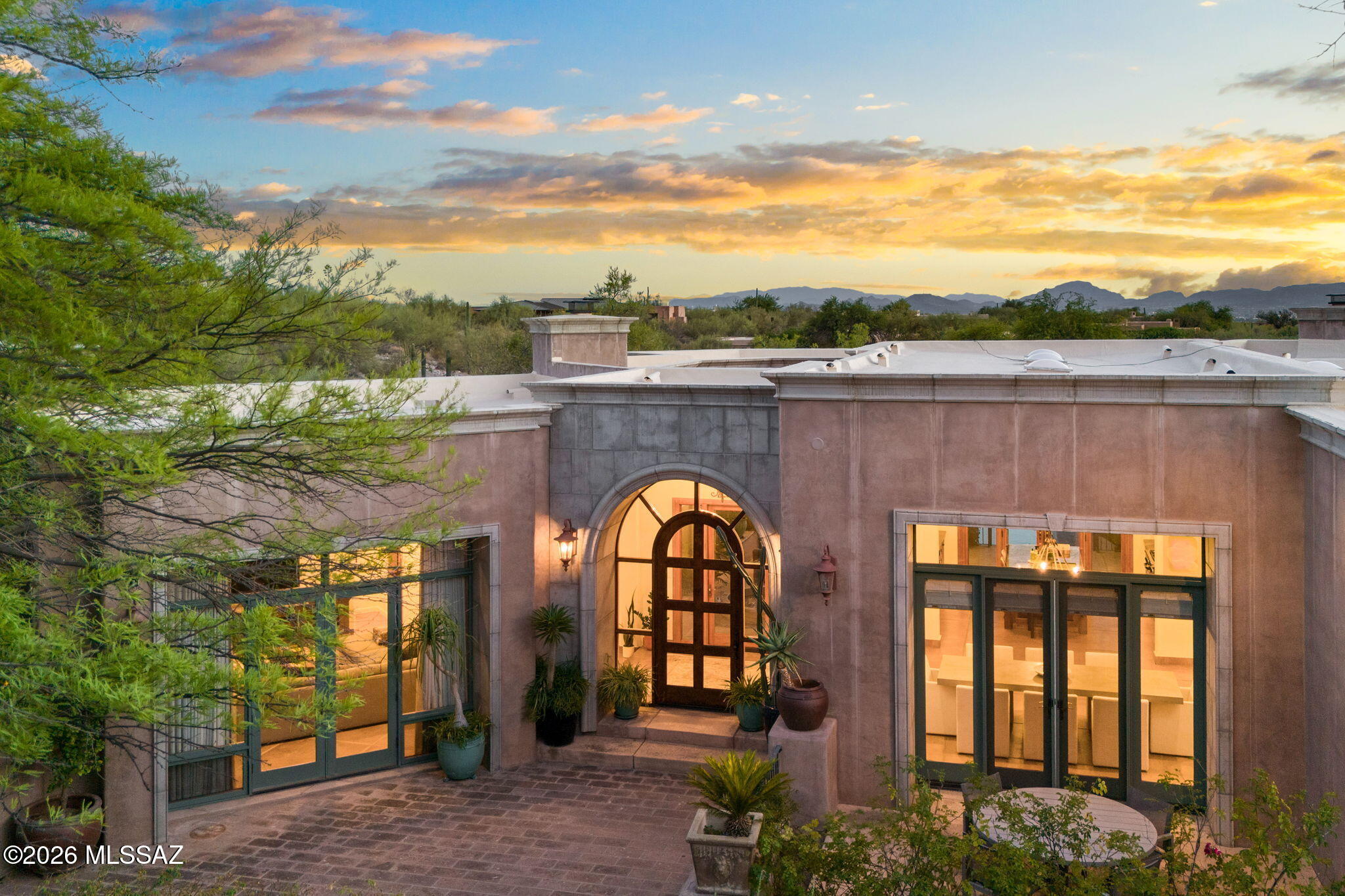 This Private Sanctuary is an Entertainers Dream - Anyone's for that Matter!  Offering an Indoor/Outdoor Lifestyle Where Patios & Courtyards Abound!  In Addition to the 3 Light & Airy Bedrooms & Den (or 4th Bedroom) & 3.5 Baths in the Main House, There's Also a 1 Bed, 1 Bath Guest House.  Top End SS Kitchen Appliances, Custom-Made Glass Bar. All the Main Living Areas Throughout, as well as the Primary Bed & Den Have Direct Access to Outdoor Living Spaces, Allowing for Seamless Movement In and Out When the Perfect Temps Arrive.  Any Lifestyle you Choose is within Minutes - Teeming with Nearby Amenities: Art Galleries, Clothing/Furniture/ Home Goods Stores, Restaurants, Golfing, Resorts, Top Rated Schools and Much More. Most Furnishings are Available for Purchase on a Separate Bill of Sale.