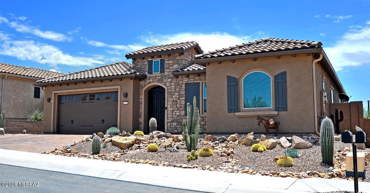Stunningly upgraded 2BD/2.5BA+den 2,514 sq ft Journey model situated on 9th fairway of Gallery golf course offering panoramic views.  Located in the Active Adult Del Webb Community at Dove Mtn.  Loads of upgrades/updating in recent months. New interior paint & amazing 20x30 inch tile added throughout (no carpet). Kitchen & primary bath feature chiseled edge quartz.  New tile accents in kitchen,bar & powder rm, new vanity in powder rm.  Beautiful courtyard gate & fountain,new driveway pavers ,new pergola extension & extensive landscape updating in front/back. Upgraded LED & other lighting. Mini split added to primary bedroom & new epoxy garage coating. Also a 3rd car separate golf garage & owned solar.  Some furnishings for sale.  Come up and enjoy the amazing Dove Mountain lifestyle!