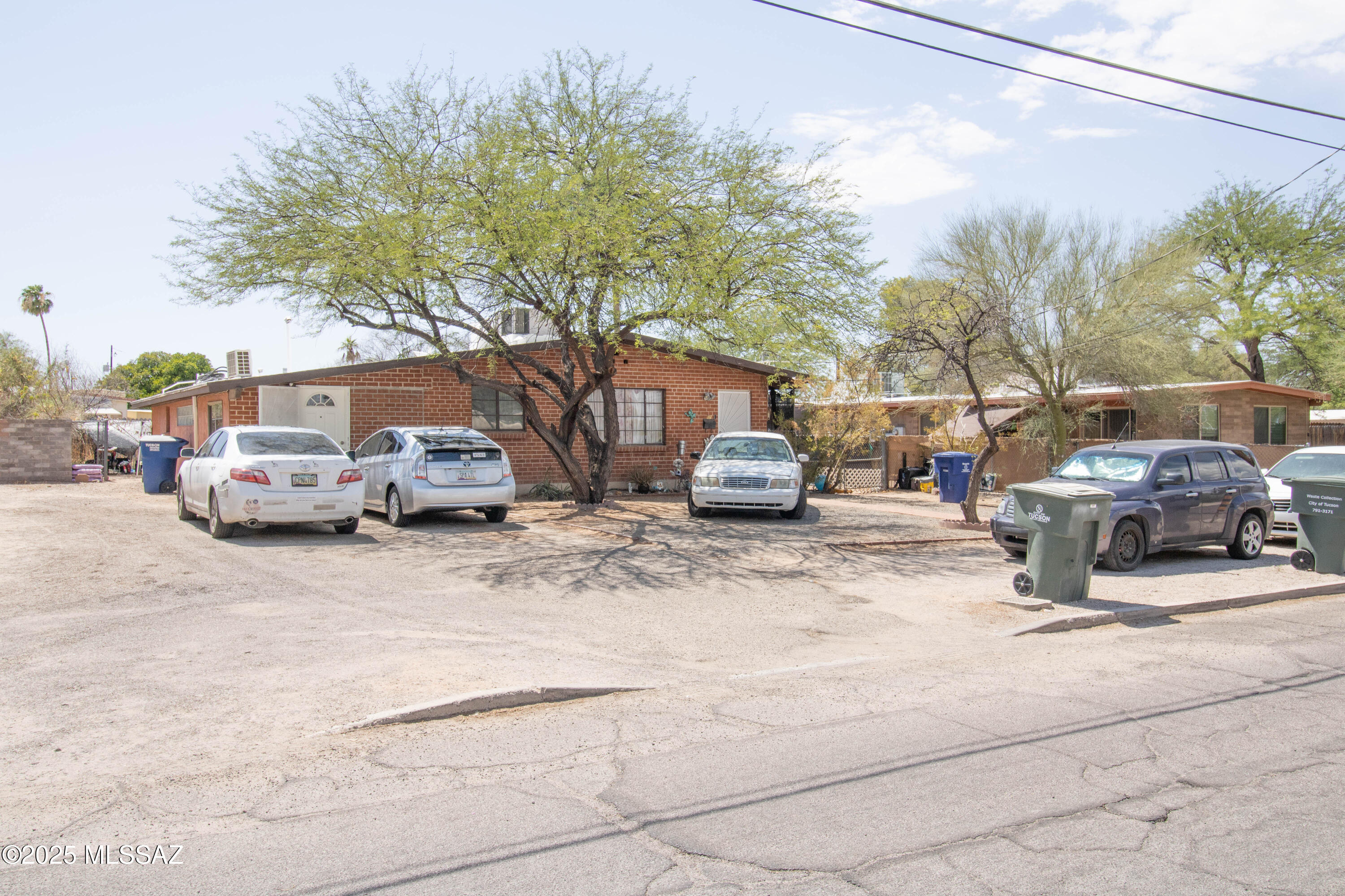 Great Investment with Long-Term Tenants - Two Units: the first is a 2-bedroom, 1-bathroom unit, and the second is a studio. Both units have A/C and washer/dryer hookups. Each unit also has its own fenced yard. The landlord pays water and gas. Great location in central Tucson. The roof has been recently recoated.  The A/C in the studio is a couple of years old.
