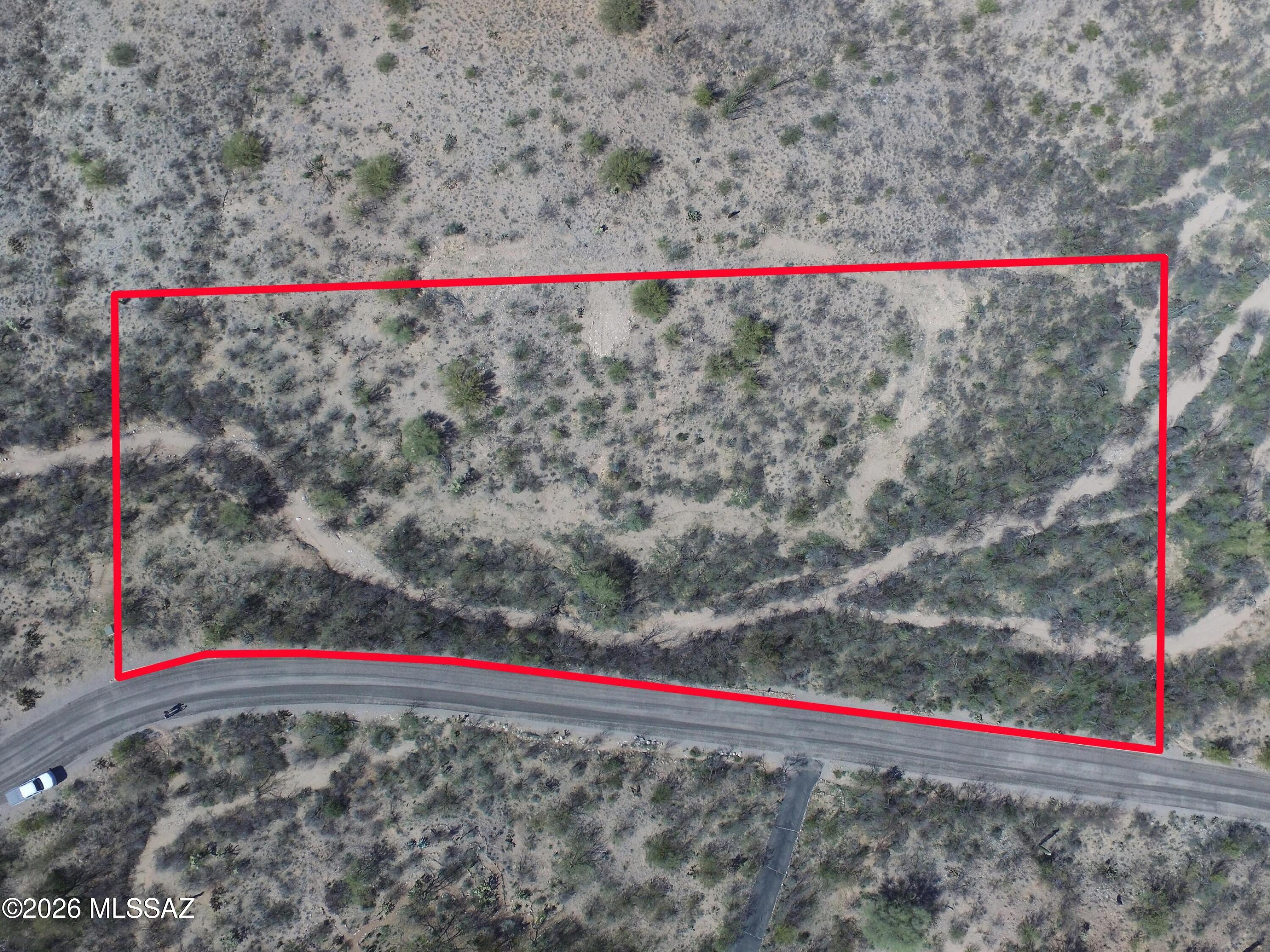 Elevate your dreams on one of the last available homesites in Rincon Desert Estates, an established community located within the highly sought-after Vail School District. Perched on an elevated hillside, this nearly 2-acre parcel offers sweeping panoramic views of the Rincon Mountains and sparkling Tucson city lights, creating a remarkable backdrop for a custom desert retreat. The generous lot size provides exceptional privacy and flexibility for home design, outdoor living spaces, and capturing unforgettable sunrise and sunset views. Conveniently located just minutes from the Rincon Valley Farmer's & Artisan's Market, with easy access to I-10 and all Tucson amenities, this rare opportunity blends natural beauty, peaceful surroundings, and everyday convenience.