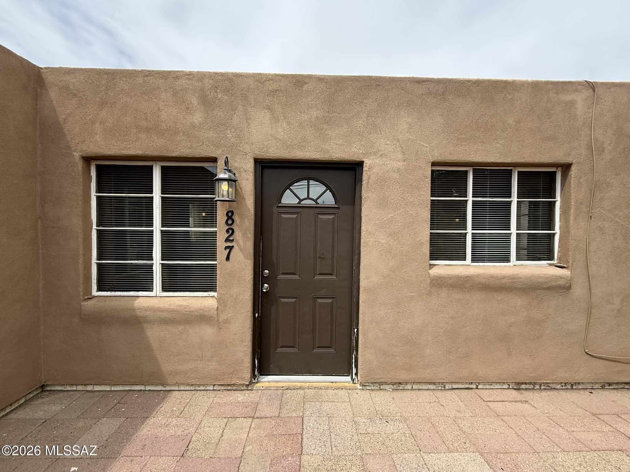 Well-located 2 bedroom, 1 bathroom home offering approximately 800 sq. ft. of comfortable living space in central Tucson. This home features a recently updated kitchen equipped with a refrigerator and stove, along with a functional layout designed for everyday convenience. Enjoy vinyl flooring, air conditioning, and heating for year-round comfort. The property also includes a private fenced backyard, perfect for outdoor relaxation or pets. Additional features include in-home washer and dryer, laundry hookups, window coverings, and ample storage space. Conveniently situated near parks, shopping, dining, and more, this home offers easy access to everything Tucson has to offer. Pet-friendly and move-in ready, schedule your showing today!