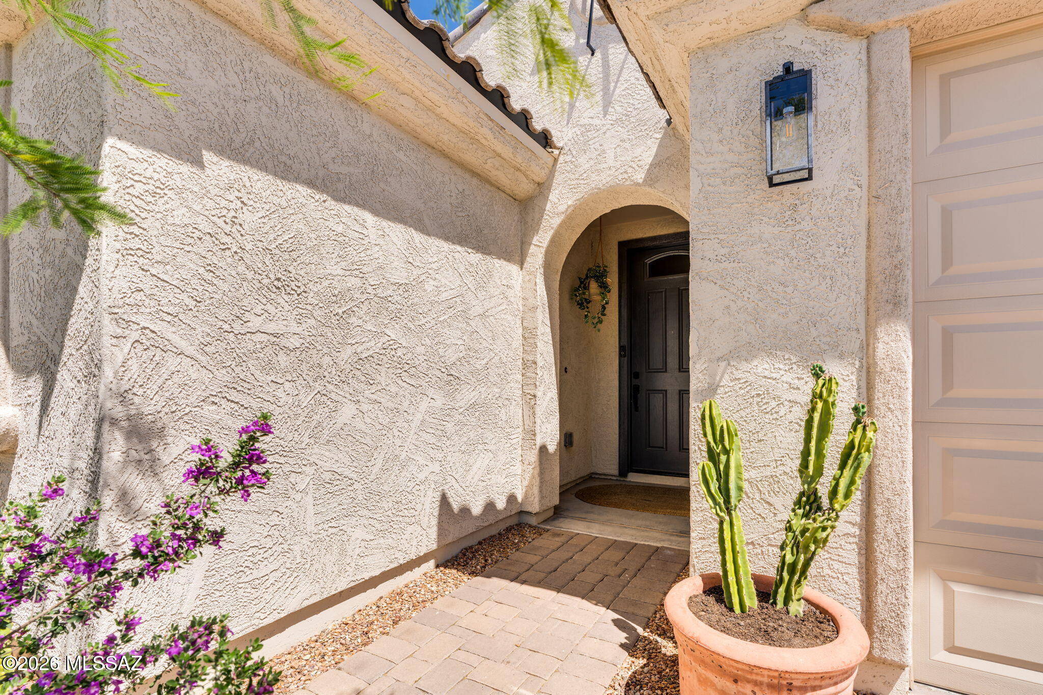 Located in the highly sought-after Rocking K community in Vail, AZ, this upgraded Pulte Cantania floor plan offers 2,230 sq ft of thoughtfully designed living space. Featuring 3 bedrooms, 3 full bathrooms, and a den with custom French doors, this home blends functionality and style. The gourmet kitchen includes a gas cooktop, granite countertops, deep stainless sink, and opens to the main living area with plank tile flooring. The spacious primary suite features a super shower, oversized walk-in closet, and direct access to an extended laundry room. The backyard is fully finished with $22K in landscaping including turf, retaining wall, raised garden beds, and mature plants. With over $96K in upgrades this move-in ready home stands out in one of Vail's premier master-planned communities.