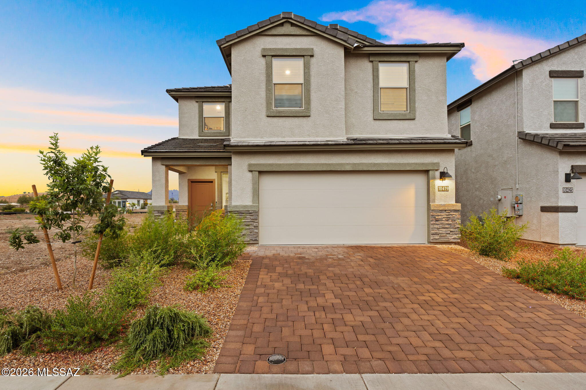 Why wait to build when you can have brand new construction right now? Welcome to this gorgeous, move-in ready Katie model a 2-story new home in the heart of Marana & the only gated community in Gladden Farms!

Perfecting blending modern design w/ desert serenity, this home shines w/ exceptional curb appeal & a thoughtfully designed floor plan. From the sleek, open-concept kitchen & spacious living areas, every inch of this prop. is crafted for happy living & entertaining.

Don't forget the comm. clubhouse complete w/ a social rm, kitchen, patio, & BBQ area, alongside a sparkling pool, a relaxing jacuzzi, a fully equipped fitness ctr, & a private dog park. Step outside to enjoy breathtaking mtn views & spectacular AZ sunsets from your private backyard, or explore the wider Gladden