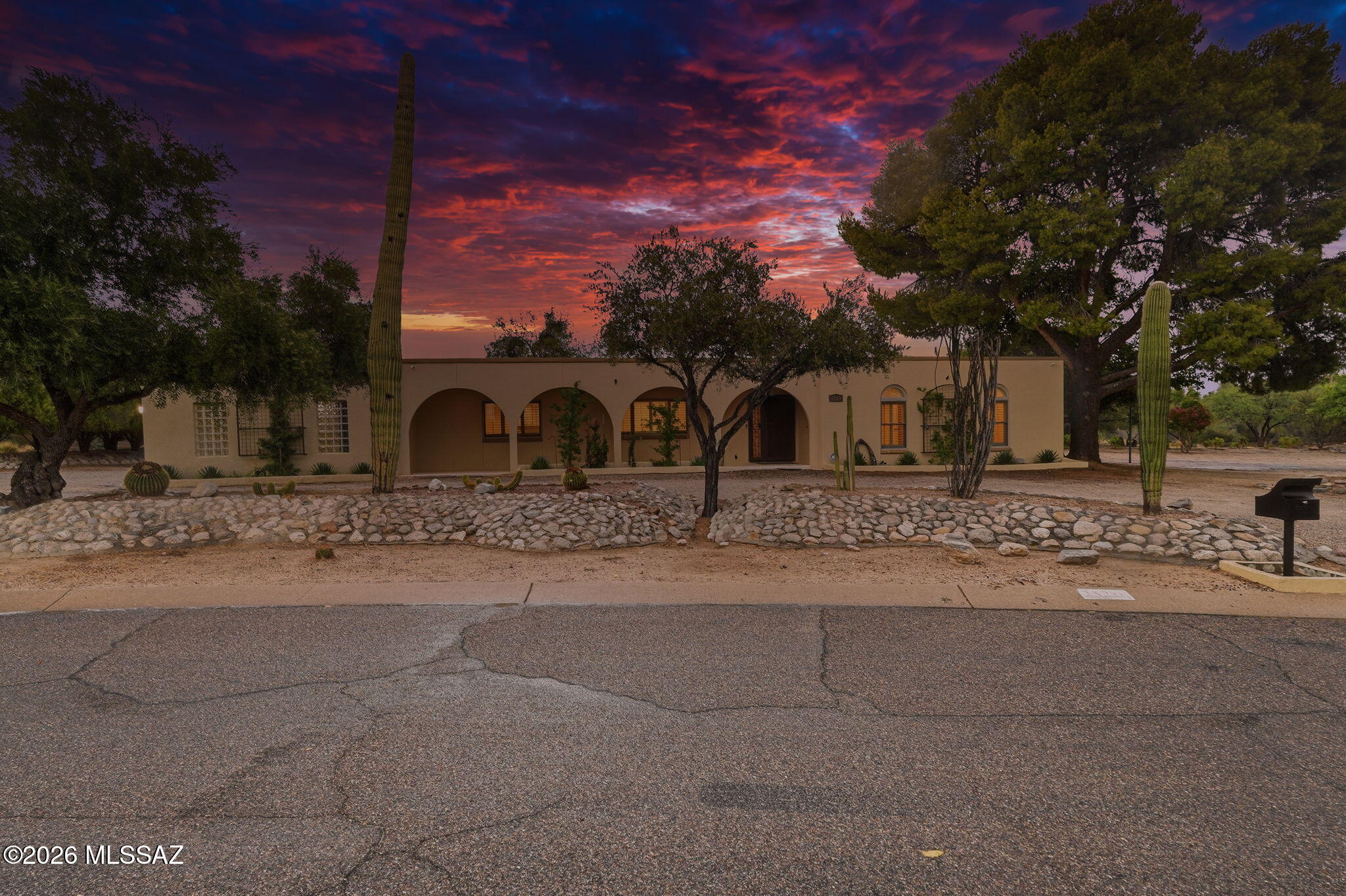 Welcome to this spacious 5-bedroom plus den, 3-bathroom home in the highly desirable Catalina Foothills. Offering 2,721 sq ft on nearly an acre, this home combines comfort, functionality, and outdoor living. The bright, open floor plan features generous living spaces, a cozy fireplace, and a versatile den ideal for a home office, playroom, or guest space. Step outside to enjoy the outdoor kitchen area, perfect for entertaining, with plenty of room to relax or customize the expansive backyard/side yard. Complete with a 2-car garage and conveniently located near hiking, golf, shopping, dining, and top-rated schools, this home offers the best of Foothills living.