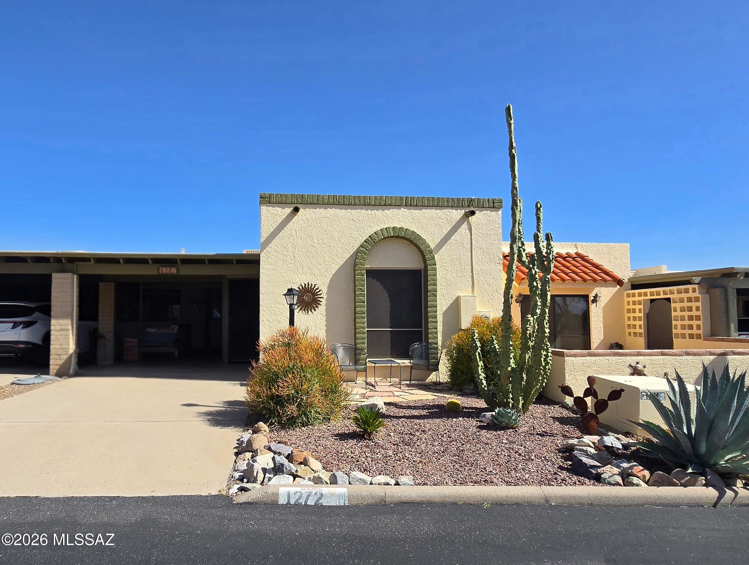 Charming 2 bed 2 bath townhome in highly desirable Desert Hills 2. Move in ready with amazing mountain views from the front and back porch. Inside you'll find upgraded kitchen counter tops and primary bathroom, with skylights that flood the home with natural light. Relax and enjoy your coffee in the backyard patio with beautiful views of natural desert and Santa Rita Mountains. This home has been loved and very well taken cared of.
