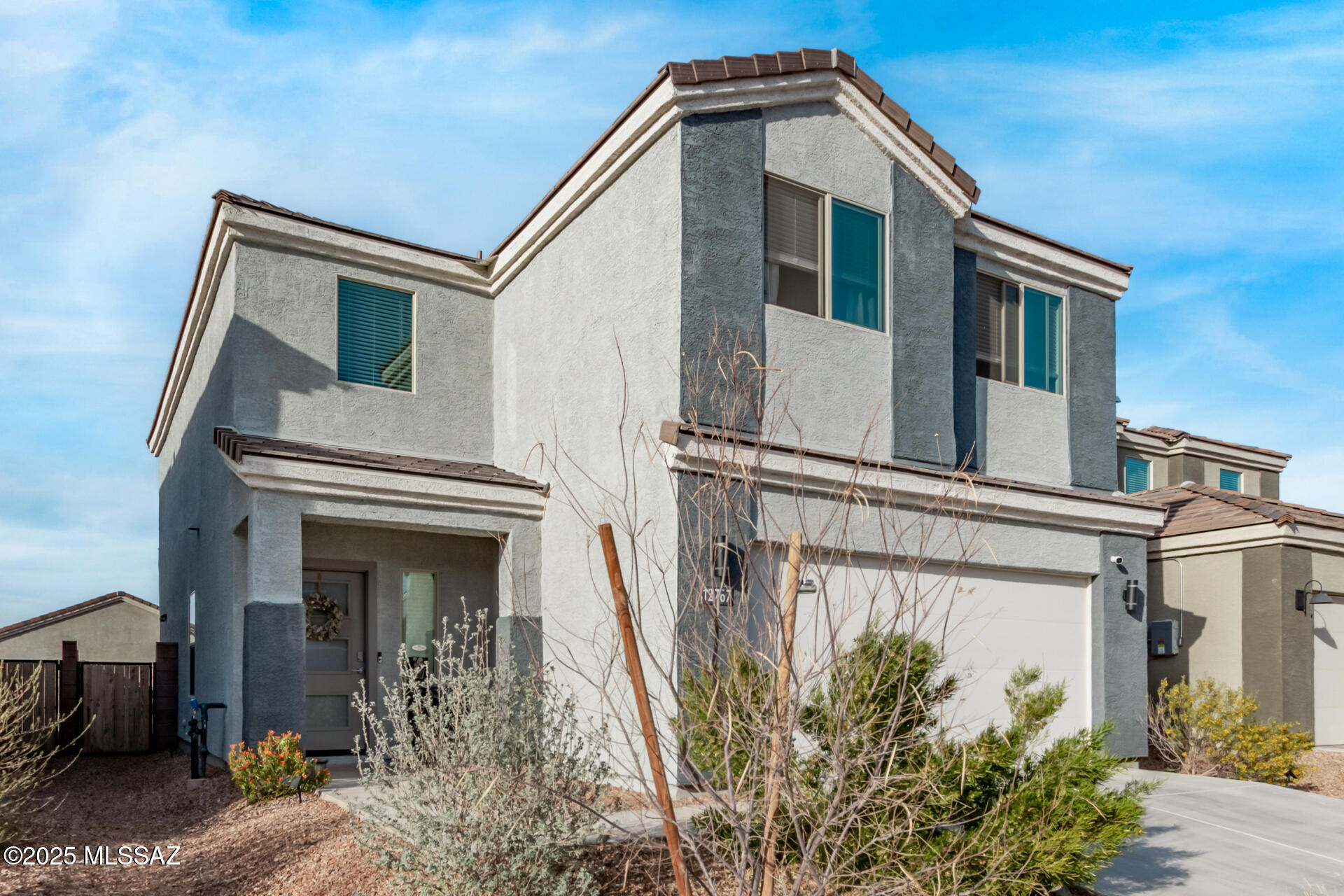 FHA Assumable Rate 4.75% | Seller Concessions Available
Built in 2022, this well-maintained 4-bedroom, 2.5-bath home offers 2,264 sq ft of functional living space in the top-rated Vail School District. Features include an open-concept great room, dining area, and kitchen with quartz countertops, Carrara marble backsplash, stainless steel appliances, touch faucet, RO system, and walk-in pantry. Upstairs includes a spacious loft, four bedrooms, laundry room, and primary suite with walk-in closet, dual vanities, walk-in shower, and mountain views. Additional highlights include a covered patio, WaterTec soft water system, tankless water heater, energy-efficient construction, and 2-car garage. Located minutes from I-10, shopping, dining, parks, and Colossal Cave.