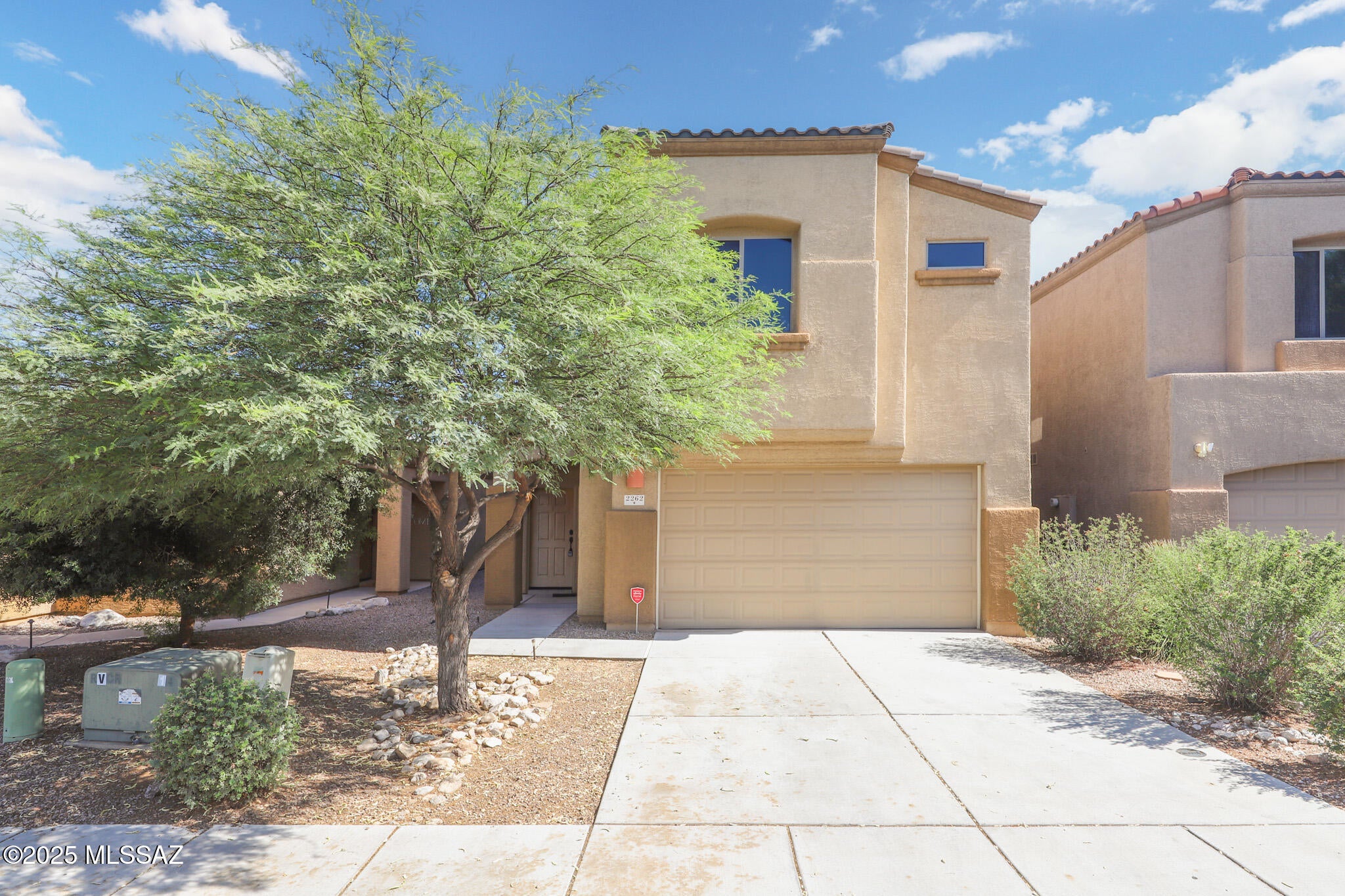 Nicely updated 4-bedroom, 2.5-bath home in the desirable Riverside Crossing neighborhood. This home features a split-bedroom floor plan, wood-look tile throughout the first floor, and tasteful decorator paint colors. The kitchen is equipped with granite countertops, a gas range, a walk-in pantry, and an island with a breakfast bar--perfect for cooking and entertaining. Conveniently located near the river path, Northwest Medical Center, shopping, and dining.