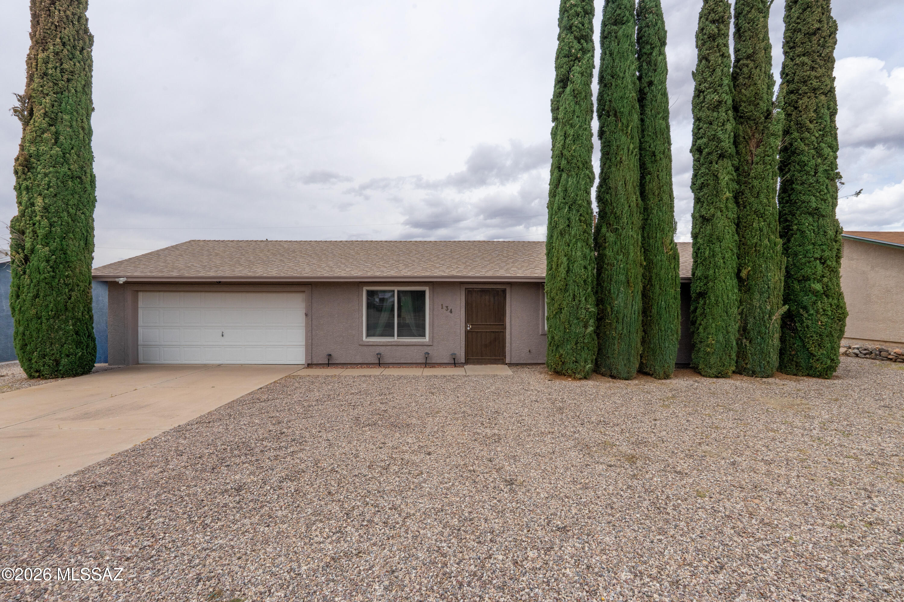 Beautifully cared for and extremely well maintained 3-bedroom 2-bath home in the A+ Award Winning Vail School District with NO HOA is a just waiting for you! Being in Corona De Tucson offers walking paths, bike trails, and parks for days! There is so much outdoor activities to keep you busy all year long. The front/curb view of this home with mature trees is enticing along with large front and back yards adds an especially appealing esthetic to give your family room and comfort from your neighbors. Wrought Iron Gates in backyard to alley, Heater replaced on 02/27/26, Replaced floats on both toilets, Replaced Capacitor on A/C, Upgraded all light fixtures, All window have new blinds, Replaced Garbage disposal, Installed new dryer vent, nice washer & dryer, this home is Turnkey ready!