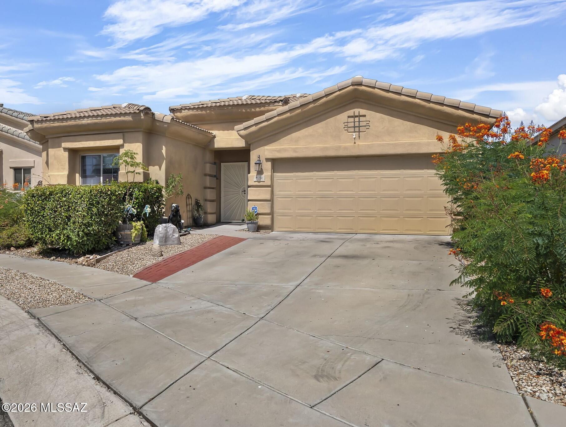 Discover the charm of this beautiful 55+ community La Joya subdivision home. Step into your future home--a beautifully maintained 3 bedroom, 2 bath residence offering 1859 square feet of inviting living space. The open-concept layout creates a spacious feel throughout the house.   The kitchen features corian countertops, ample cabinetry, and an oversized breakfast bar.   The spacious living area is perfect for hosting loved ones, while the warm, neutral color palette complements any interior style. Enjoy the serenity of your private backyard. 

Living in this La Joya subdivision means enjoying a wide range of amenities.  Residents have access to a clubhouse, spa, pickleball courts, recreation room, and a pool ideal for unwinding. This home offers the ideal balance of comfort, style, and low-maintenance living in a desirable area. Located close to shopping, golf, medical facilities, and restaurants, this exceptional home offers an active lifestyle in a great community. Come and enjoy the best of Green Valley living.