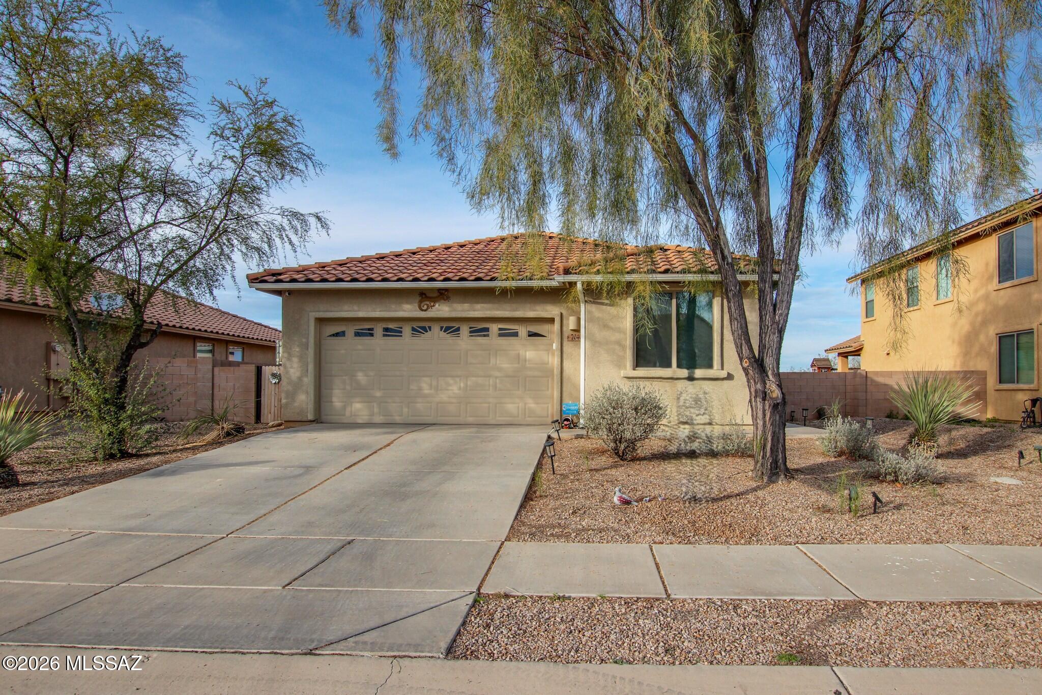 Stunning single story residence with breathtaking mountain views. This 4-bedroom, 2-bath home offers refined open concept living, featuring a spacious great room and an upscale kitchen with a large island, granite countertops, and stainless steel appliances. The desirable split bedroom layout provides a private primary suite with a walk-in closet, dual vanities, and a spa-inspired soaking tub/shower. Well-appointed secondary bedrooms offer comfort and versatility.
Enjoy outdoor living in the fully fenced backyard, offering privacy and a covered seating area perfect for relaxing or entertaining. Additional highlights include a dedicated laundry room, 2-car garage, energy-efficient solar with a low remaining balance, partial flooring updates, and fresh interior paint throughout making this home truly move-in ready. Don't miss this exceptional opportunity!