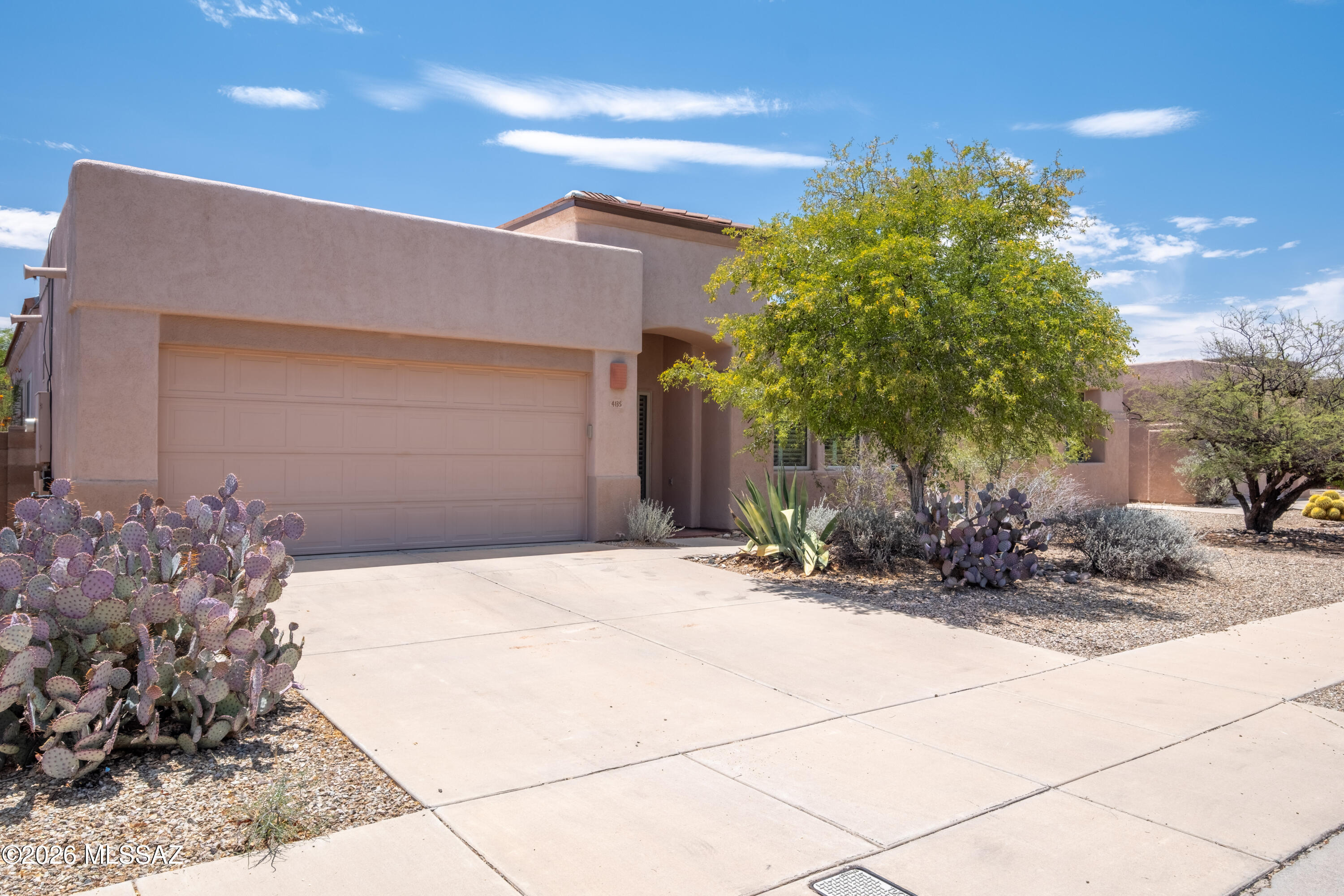 Peace and tranquility await you, just moments outside of Tucson.  Convenient to some of the best hiking and biking trails in Tucson, this 3 bedroom 2 bath home is situated in the Ranch Agua Dulce community, a World Wildlife Federation neighborhood.  The interior is in excellent condtiion also featuring a brand new refrigerator and dishwasher.  High ceilings, saltillo tile throughout the main living areas and primary suite, and the high-quality carpeting in the auxilliary bedrooms make this home feel very luxurious.  Many recent upgrades.  Seller has been very diligent on maintaining the home and has invested in upgrades every year.  Community features a heated pool and playground.