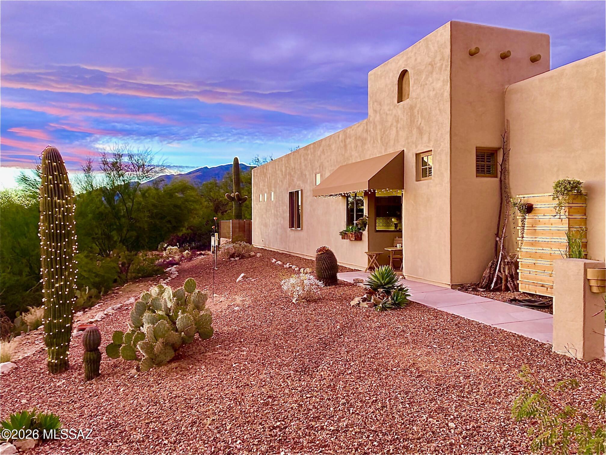 The perfect full-time or vacation lifestyle awaits in Gated Sabino Springs - home of the Arizona National Golf Course! Enjoy End of Road Privacy w/ Sante Fe Flair! Stunning Views of the Green from your front door & while sipping java at your Cafe! Views of the Catalina Mountains - where it matters most - from living space & cov patio! Bricked area for dining under the stars. View fencing adds a sense of space & opportunity for wildlife viewing. Common natural area behind. Privacy wall shields the neighbor's yard. This home has been gently enjoyed seasonally for many years. Furnishings avail. by sep. bill of sale. Split BRs w/walk-in closets are ideal for hosting guests. Com. pool/rec center/gym. The golf course is public. Designed by Robert Trent Jones, is both challenging & spectacular!