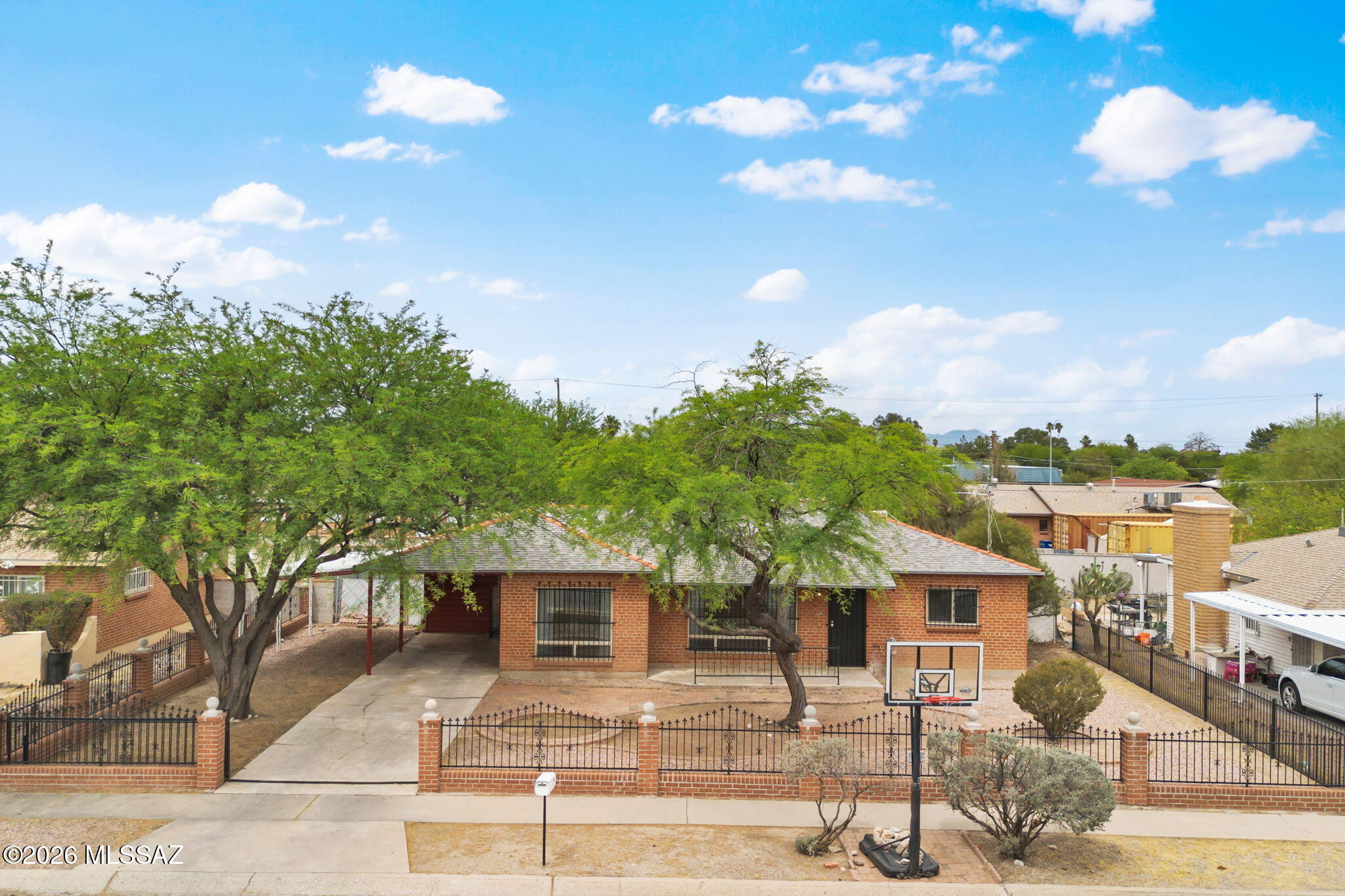 This charming 1955 brick bungalow sits in an established neighborhood close to the city center, offering quick access to essential amenities while retaining the character and craftsmanship of mid century construction. Built with superior materials including red brick, old growth lumber, and plaster walls it provides excellent insulation, durability, and soundproofing rarely found in newer homes. Designed for single level living, the layout eliminates stairs, making it ideal for easy mobility, low maintenance living, and aging in place. Its efficient footprint is simple to heat, cool, and clean, while still feeling warm and inviting. The home's authentic mid century aesthetic offers plenty of opportunity for personalization through updates that complement the original style. A generous yard added privacy, outdoor living space, and room to garden or entertain. Recent improvements include Freshly painted interior walls and ceilings, New carpet in all three bedrooms, New stainless steel kitchen appliances Hickory cabinetry paired with granite countertops. This home blends timeless construction with modern update perfect for anyone seeking comfort, character, and convenience.