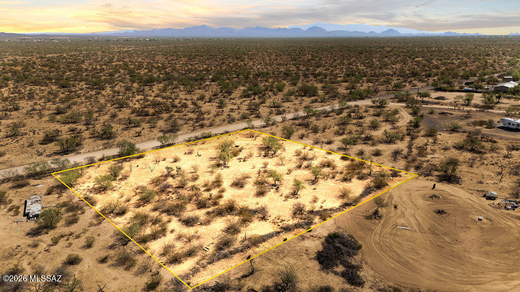 Buildable flat lot that offers freedom to live how you like. No HOA and only 30 minutes to the conveniences and shopping of Tucson. Three Points offers numerous conveniences such as the Three Points General Store, Ace Hardware, Chevron Gas Station, an Animal Feed Store, Tire Shop and more. There is also a public park nearby with a playground, large grass field along with basketball courts and a baseball field. Enjoy the peace and quiet of country living while enjoying spectacular sunsets and star gazing all at a great price!