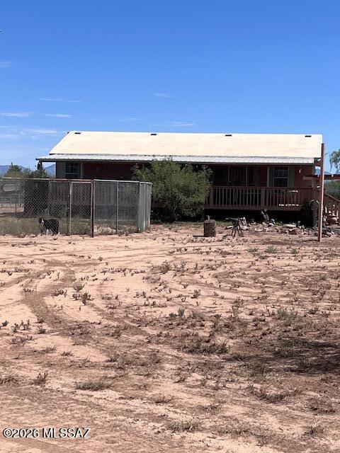 Well maintained Manufactured Home with a front deck, great room, new American Made Appliances. Property includes a chicken coop, two car garage with tack room, connex box, and horse facilities. 10.5 acres fully fenced.