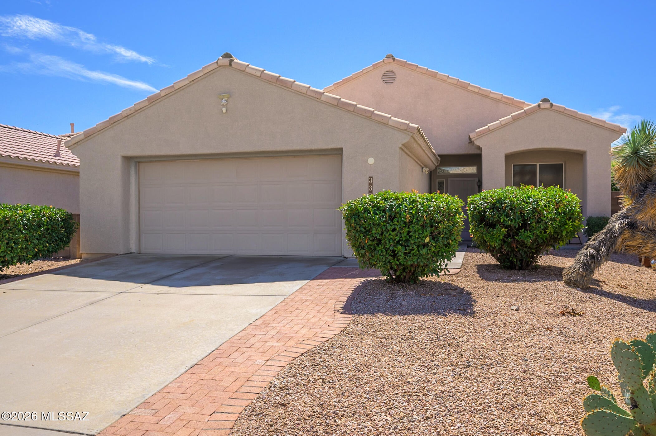 Welcome to easy Green Valley living in this inviting 2-bedroom, 2-bath home with a versatile den and extra office space, located in the gated community of Sunrise Pointe Vistas. Offering 1,542 sq. ft., this well-designed home features a bright, open living area where the kitchen flows seamlessly into the living room making it perfect for everyday living and entertaining. Easy-care solid-surface flooring runs throughout the main living spaces making it a breeze to keep clean. The versatile den is ideal for a hobby room or additional sitting area, while a separate office provides a dedicated workspace with ample storage... Step outside to a spacious backyard with a raised privacy wall and plenty of room to create your ideal outdoor retreat. Located in Green Valley, recognized by Forbes as one of the country's top retirement destinations, this home offers the perfect opportunity to enjoy the Southern Arizona lifestyle and all that Green Valley Recreation has to offer. Don't miss this Sunrise Pointe Vistas gem!
