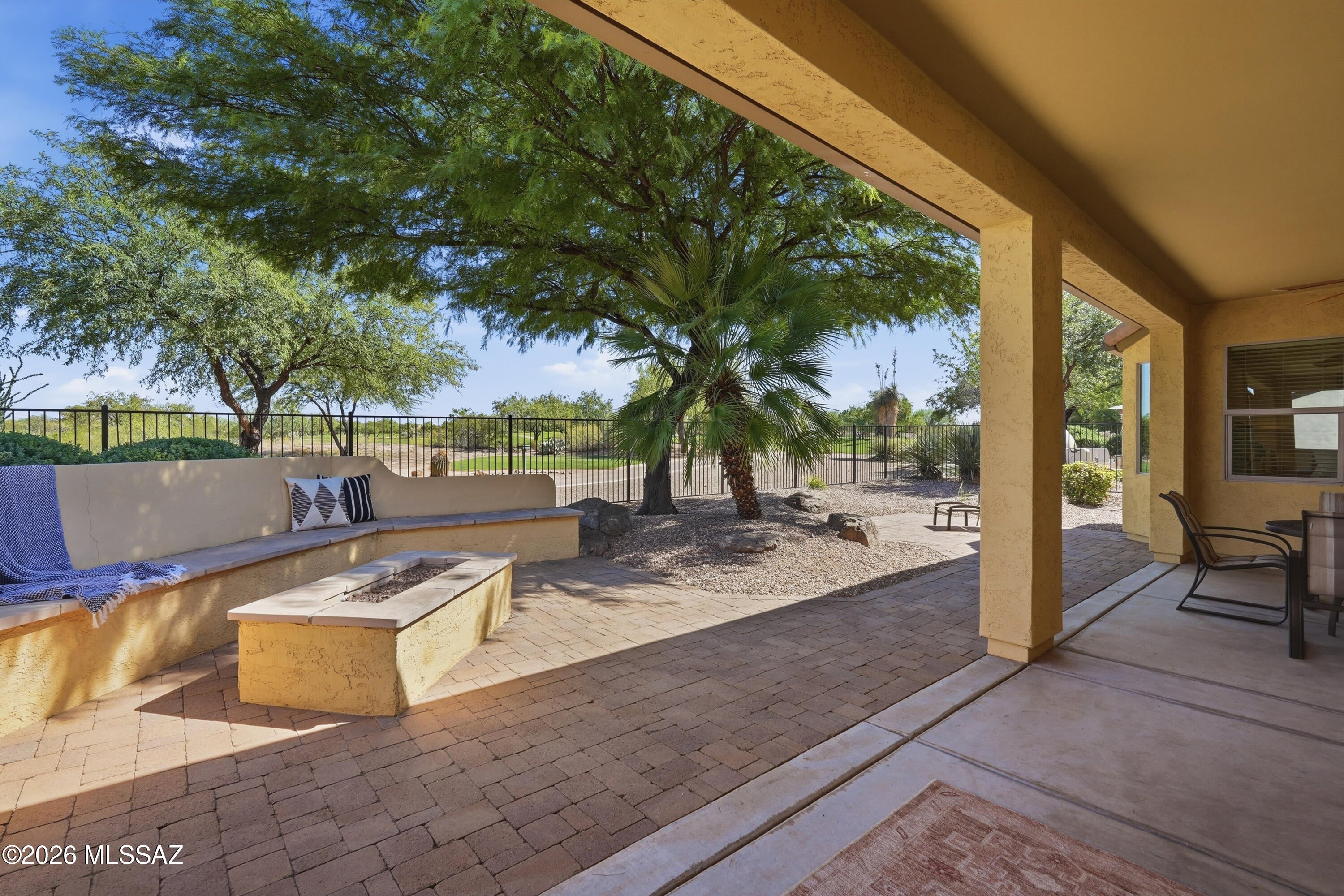 Beautifully refreshed home on the golf course at Saddlebrooke Ranch - fully furnished, so all you have to do is bring your clothes. Step onto the back patio and the fairway is right there - featuring a built-in BBQ, a firepit, and a view fence (2024) that keeps the sightline open to the green. This is where you'll spend all your time! The kitchen features upgraded cabinetry, granite countertops, and a new refrigerator (2025). The open, split floor plan puts the primary suite on one side and the second bedroom plus versatile den on the other; room to host, room to retreat. New carpet (2024). The garage is extra deep, fitting a car and golf cart in tandem on one side. Saddlebrooke Ranch amenities included - start living the golf-course life you've been picturing. Schedule your showing today.