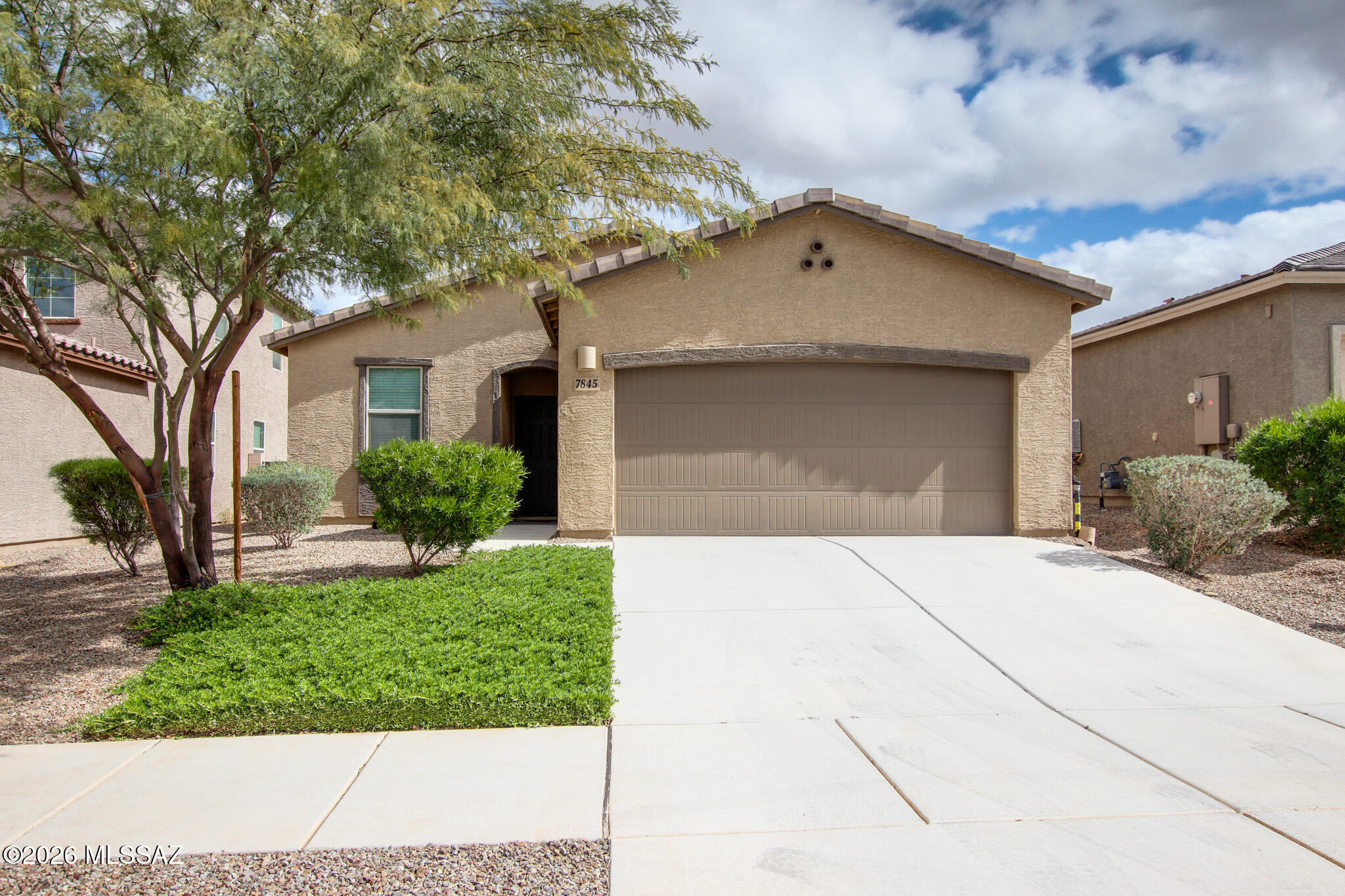 Welcome home! This beautifully maintained 3-bedroom, 2-bath home in Star Valley offers 1,391 sq ft of thoughtfully designed living space. The open-concept layout creates a seamless flow between the spacious living and dining area, making the home feel bright and inviting. The kitchen is a standout feature with granite countertops, stainless steel appliances, and abundant cabinetry for storage and functionality and a new water softener. This property also has a fully landscaped, enclosed backyard designed for easy outdoor living, perfect for entertaining, weekend barbecues, or simply enjoying Arizona sunshine. With modern finishes throughout and true move-in ready condition, this home offers the ideal blend of convenience and comfort in the Star Valley community.