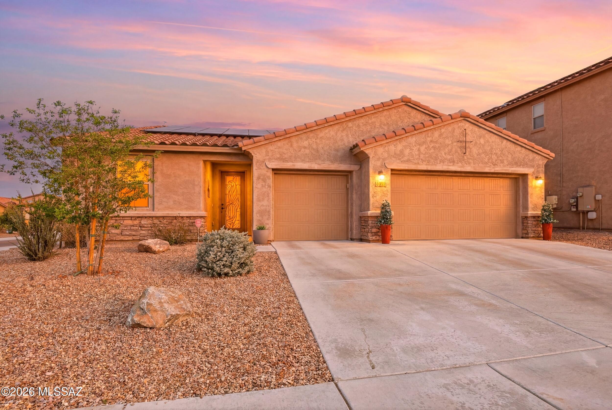 Welcome to your beautiful new home nestled in the up and coming Twin Peaks area of Marana. This 2019 Mattamy Build home is 3 Bedroom+Den, 2 Bathrooms and features tons of builder updates including a gourmet kitchen with Soft Closing Cabinetry, Fiully-Equiped laundry facilities with Mud Sink, and a Primary Ensuite that has the perfect Spa-Like feel. The home itself has PAID OFF Solar Panels, Water Softener,  a massive 3 car garage, and plenty of storage. All stainless steel appliances and Washer/Dryer stay in the home. Just move on in and you are ready to go with all the value added items. Schedule a tour today!